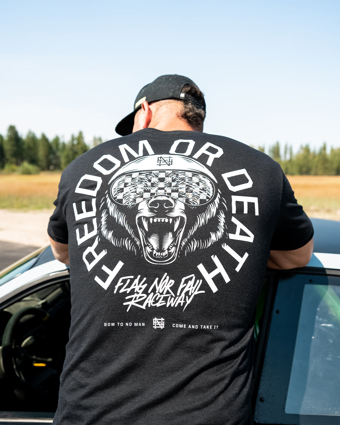 Race Track Bear Graphic Tee - Black Cotton T-Shirt for Men & Women - Casual Streetwear, Gaming & Motorsport Enthusiasts