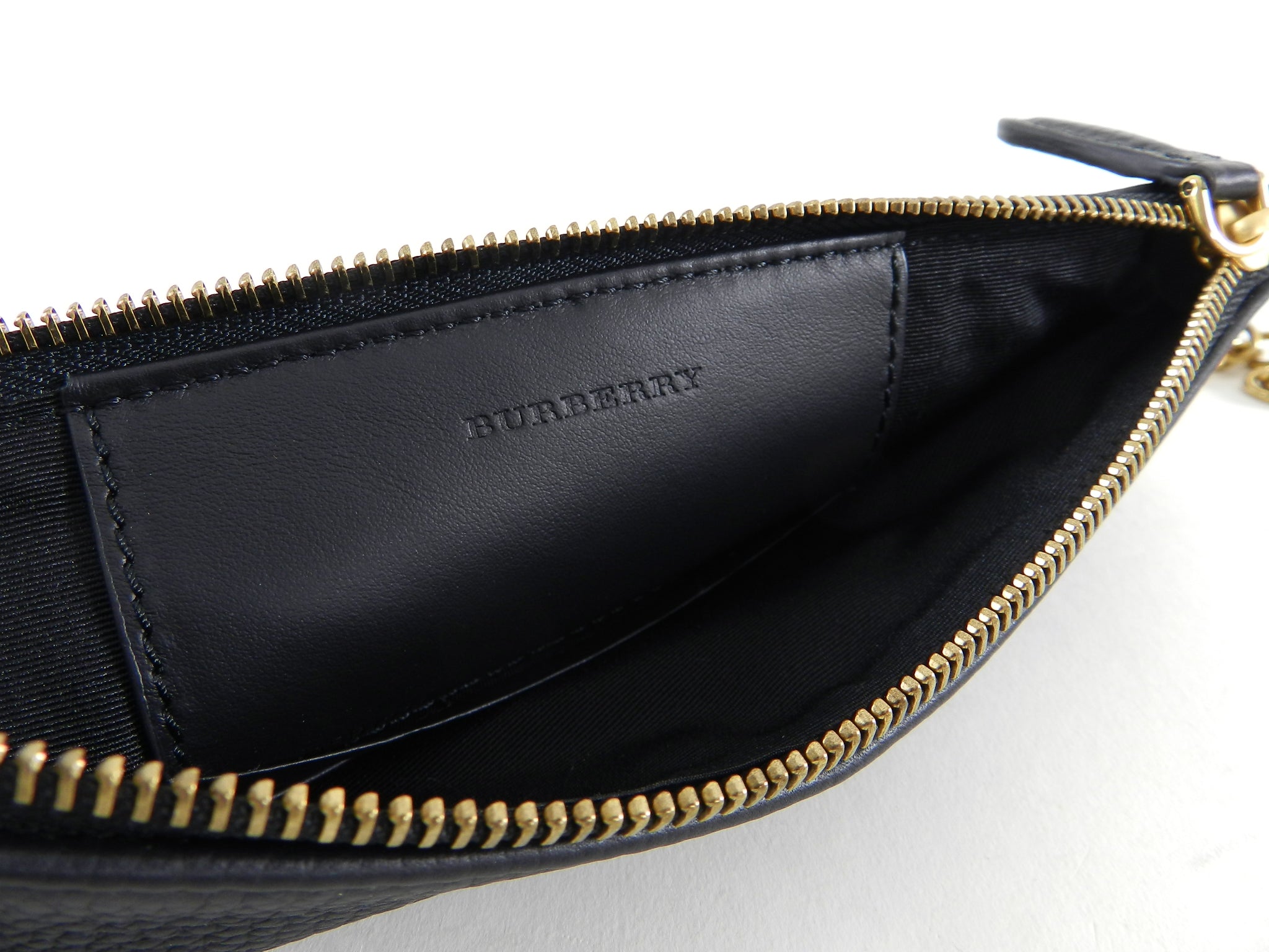 Burberry Black Peyton Embossed Logo Zip Crossbody Bag for Women | Luxury Leather Shoulder Bag | Perfect for Work, Travel & Evening Out