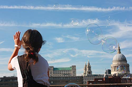 20x30 Inch Laminated Poster - Vibrant Little Girl Playing with Soap Bubbles - Home Decor for Kids' Room, Nursery & Playroom - Perfect for Framing & Wall Art