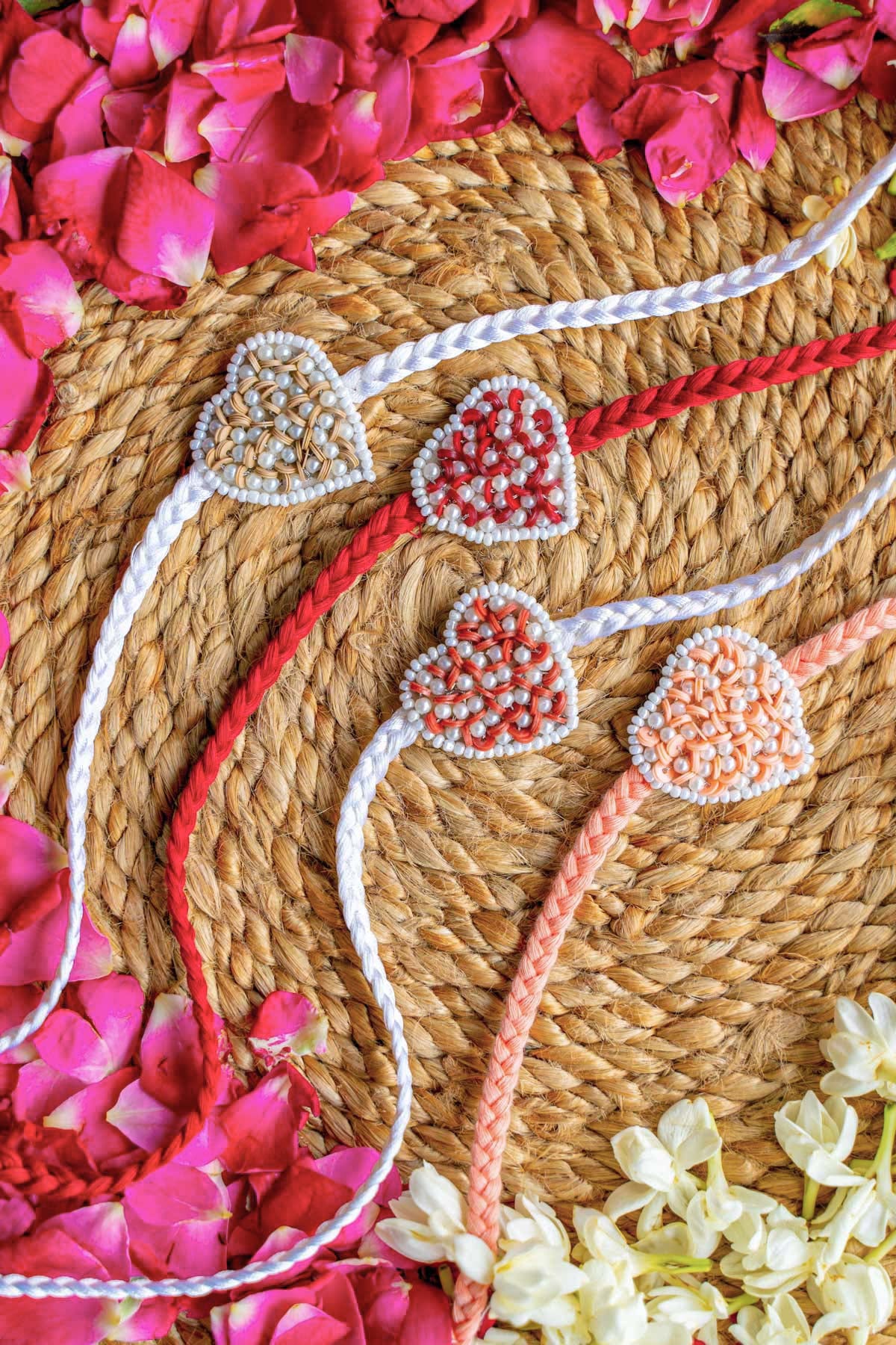 Beautiful Love Knot Embroidered Rakhi Set of 4 - Traditional Indian Bracelet for Raksha Bandhan Festival - Perfect for Brother-Sister Bonding, Gift Giving & Cultural Celebrations