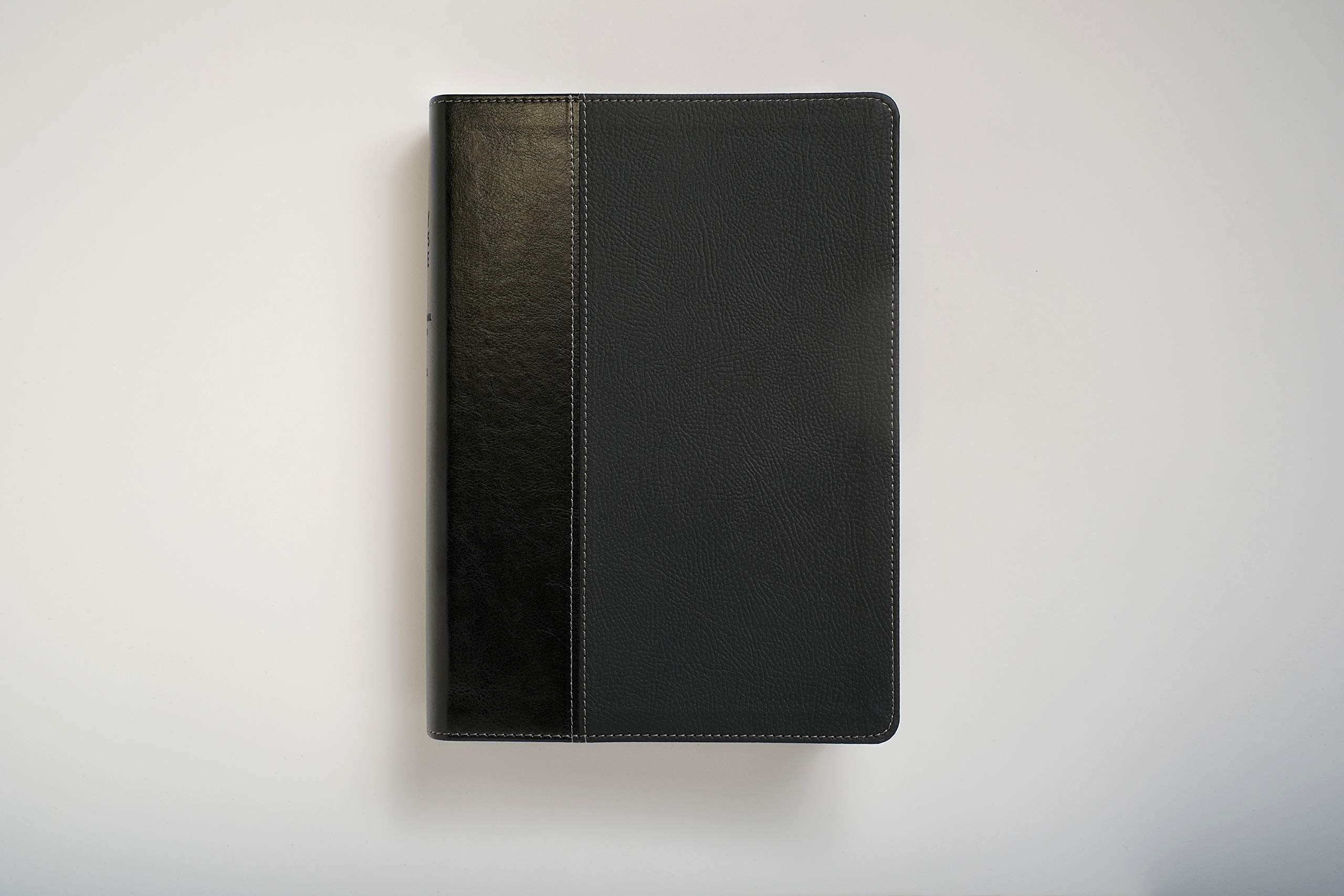 Every Man's Bible NIV, Large Print, TuTone LeatherLike (Onyx/Black) - Study Bible for Men with Devotional Notes, Book Introductions & 44 Charts - Perfect for Personal Study, Small Groups & Men's Ministry