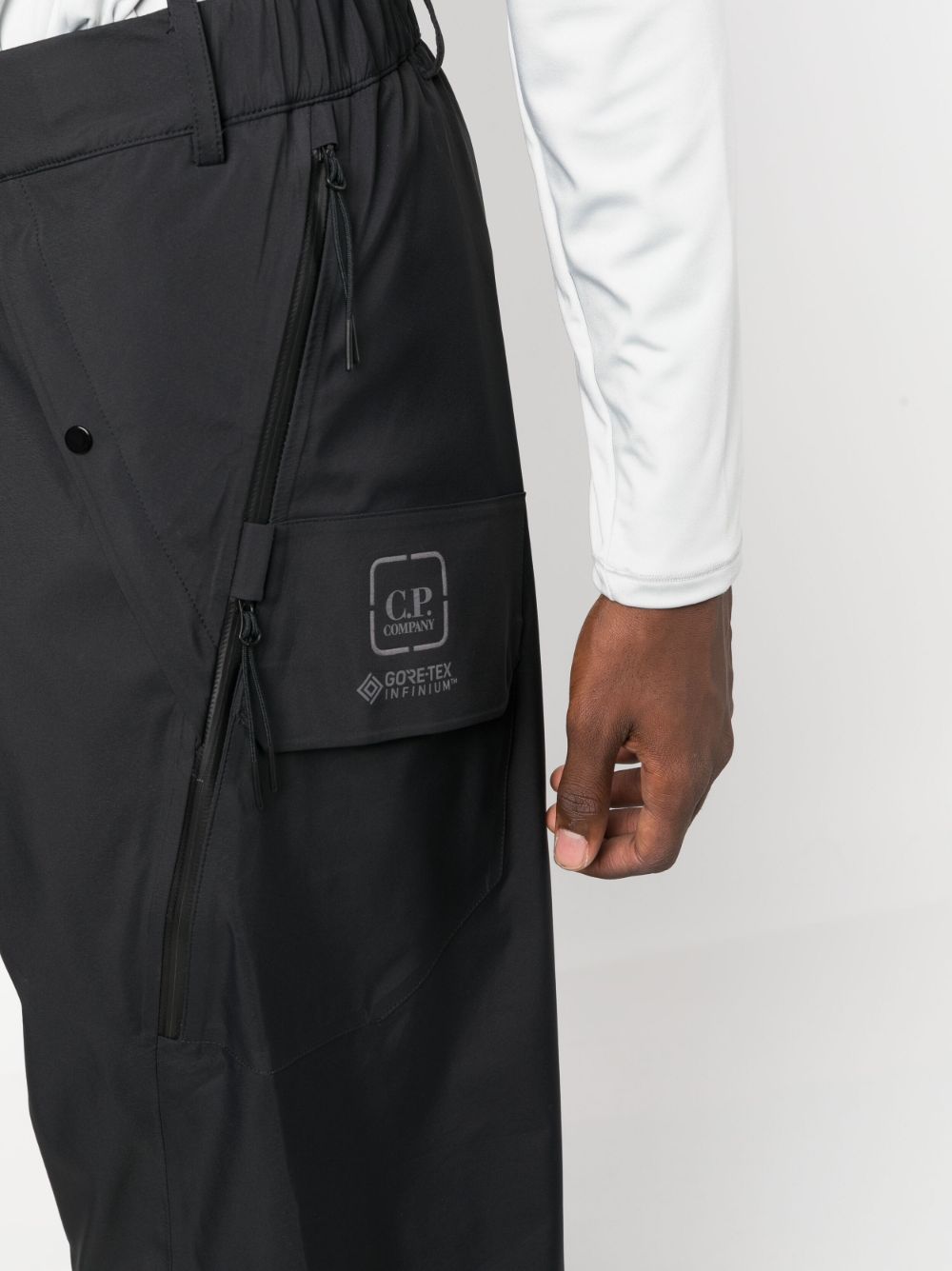 C.P. COMPANY METROPOLIS Trousers for Men - Black Casual Pants with Water-Resistant Fabric | Perfect for Urban Commuting, Travel & Outdoor Activities