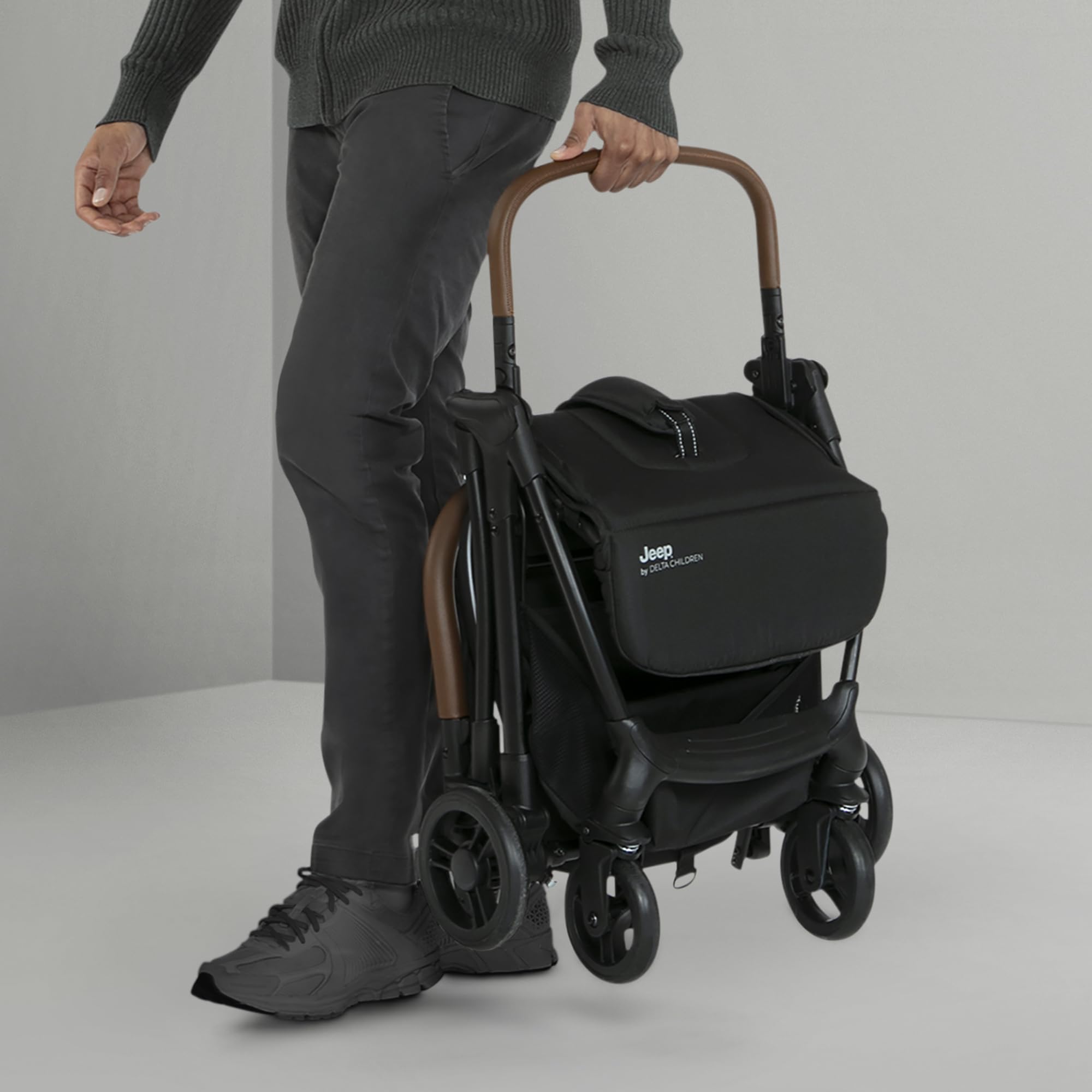 Delta Children Jeep Altitude Compact Travel Stroller - Lightweight, Easy One-Hand Fold, Extendable Canopy with Peek-a-Boo Window, Reclining Seat & 4-Wheel Suspension | Greenguard Gold Certified | Perfect for City Walks, Travel & Shopping (Black)