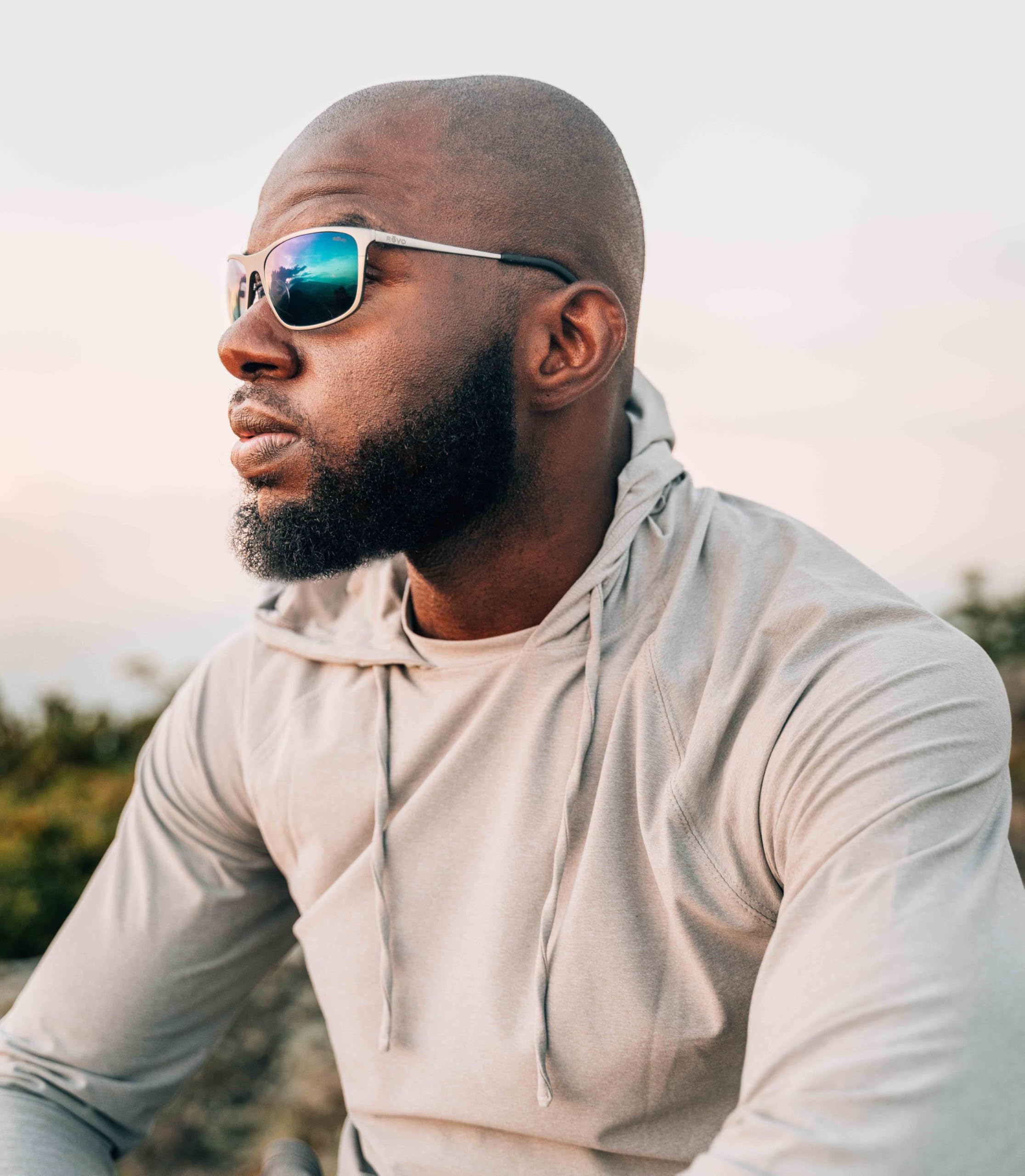 Revo Meridian Polarized Sunglasses - Titanium Wraparound Frame for Men & Women - UV Protection for Driving, Running, and Outdoor Activities