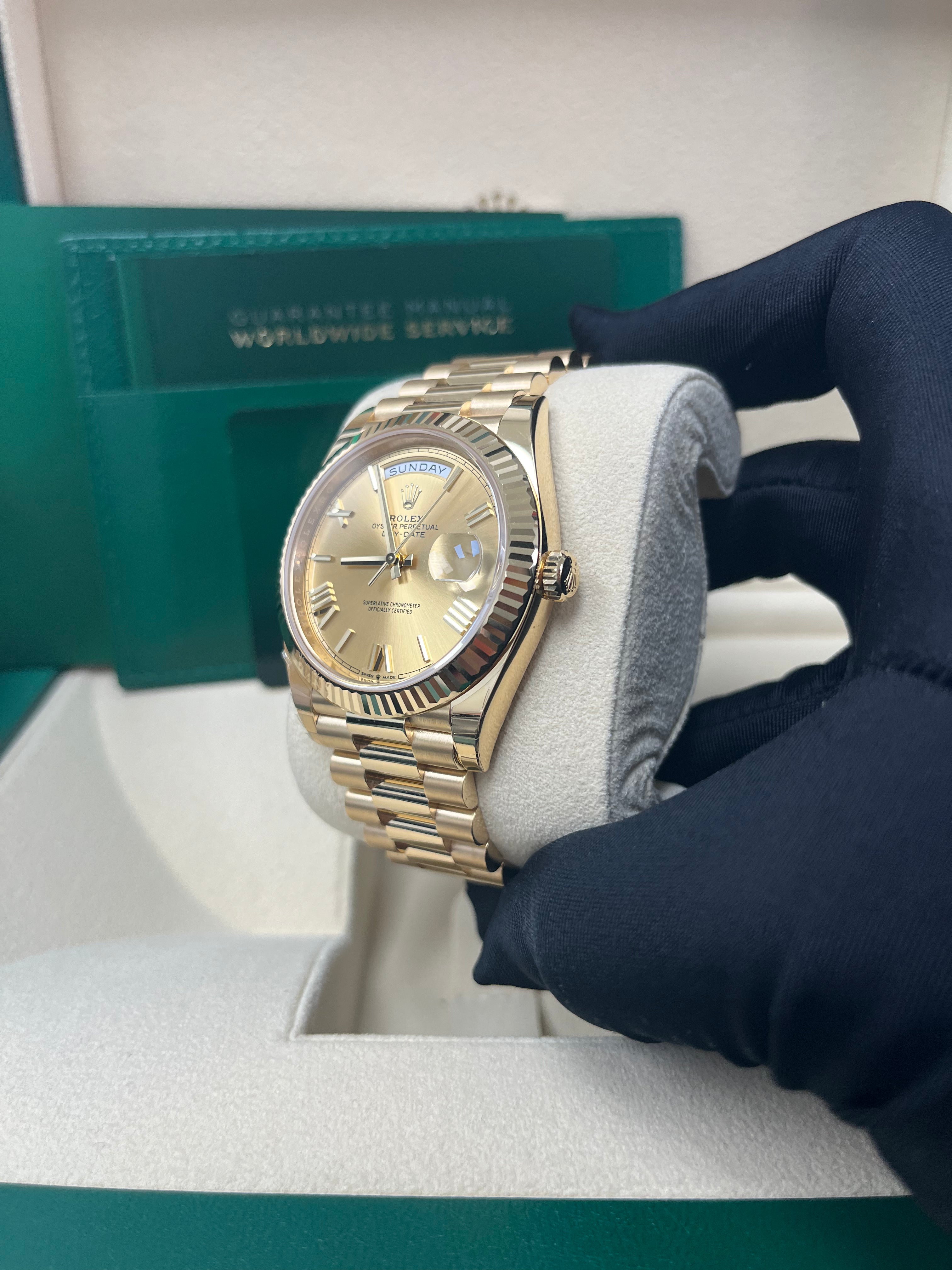 Rolex Day Date 40mm 18K Yellow Gold Men's Watch with Champagne Roman Dial & Fluted Bezel (Ref #228238) - Luxury Dress Watch for Business & Formal Occasions