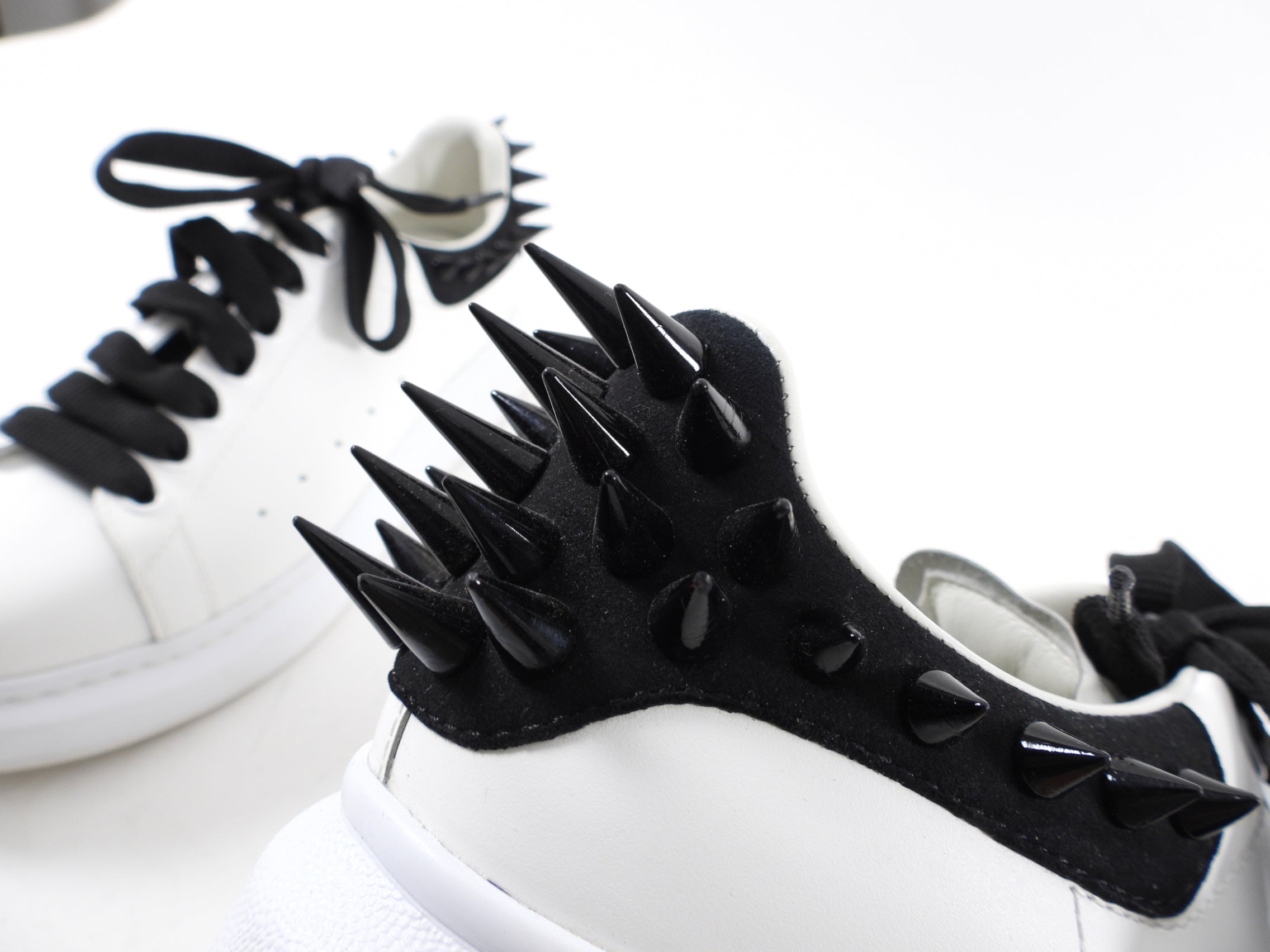 Alexander McQueen White Leather Sneakers with Black Spikes - Women's Size 39 | Luxury Fashion Designer Shoes for Casual Wear & Street Style Outfits