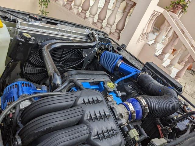 High-Performance All-Aluminum Radiator for 1987-2006 Jeep Wrangler TJ (2.4L 2.5L 4.0L 4.2L L4 L6) - 3-Row Cooling System with Fan Shroud & Relay - Perfect for Off-Roading & Extreme Weather Conditions