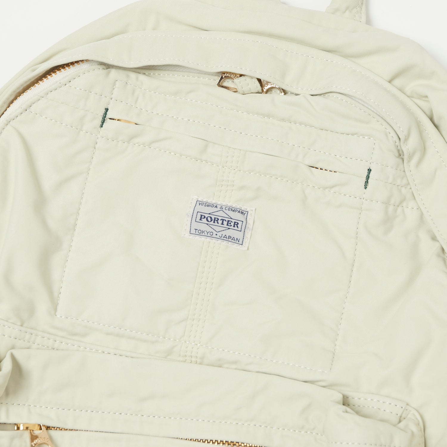 Porter Yoshida & Co. Mile Daypack Backpack - Lightweight Travel Backpack for Men & Women, Water-Resistant White Daypack for Hiking, Commuting & Everyday Use