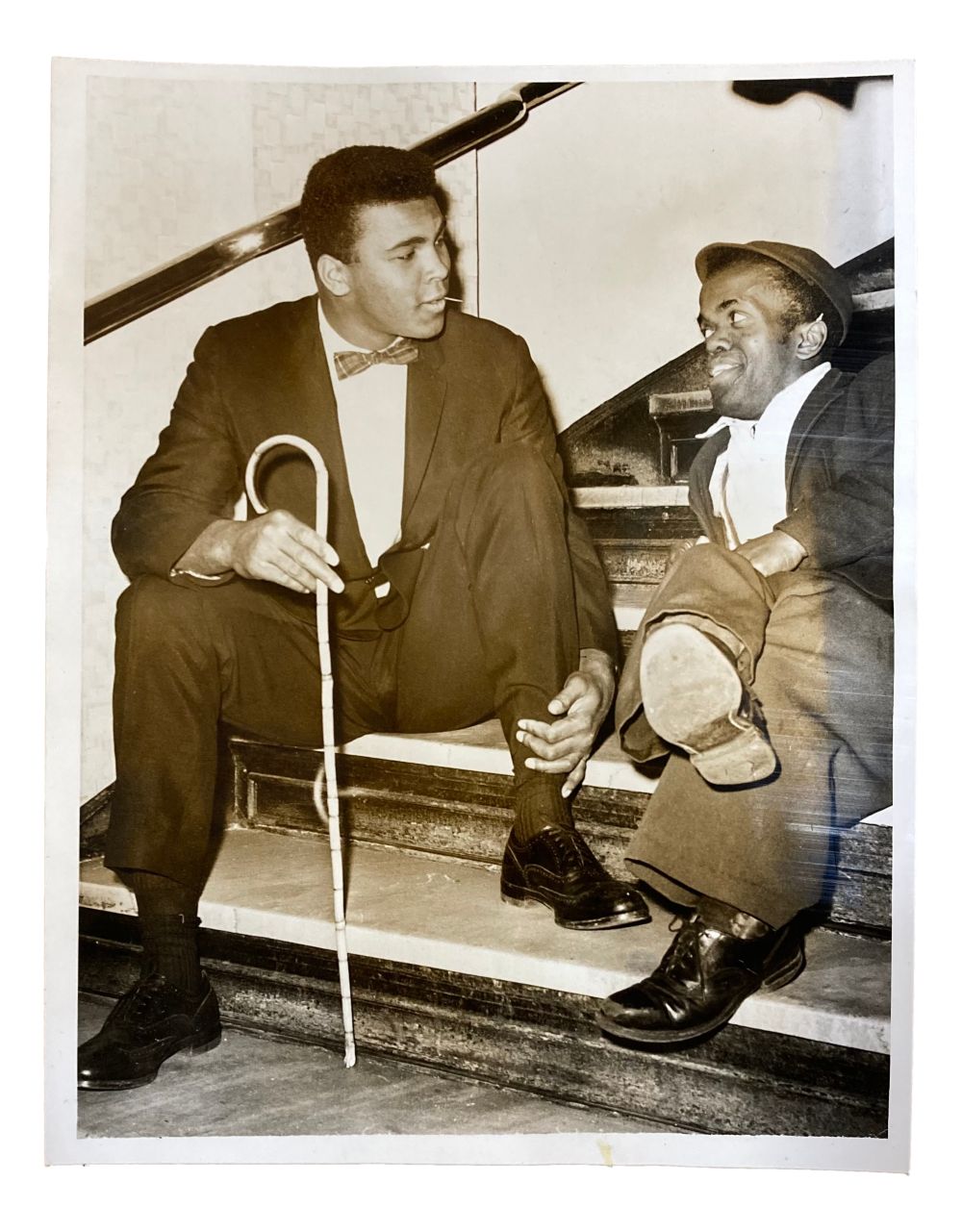 Muhammad Ali Vintage 1960s 7x9 Hotel Theresa UPI Press Photo - Rare Collectible Memorabilia for Boxing Fans & History Enthusiasts - Perfect for Home Decor, Man Cave, or Sports Memorabilia Collections