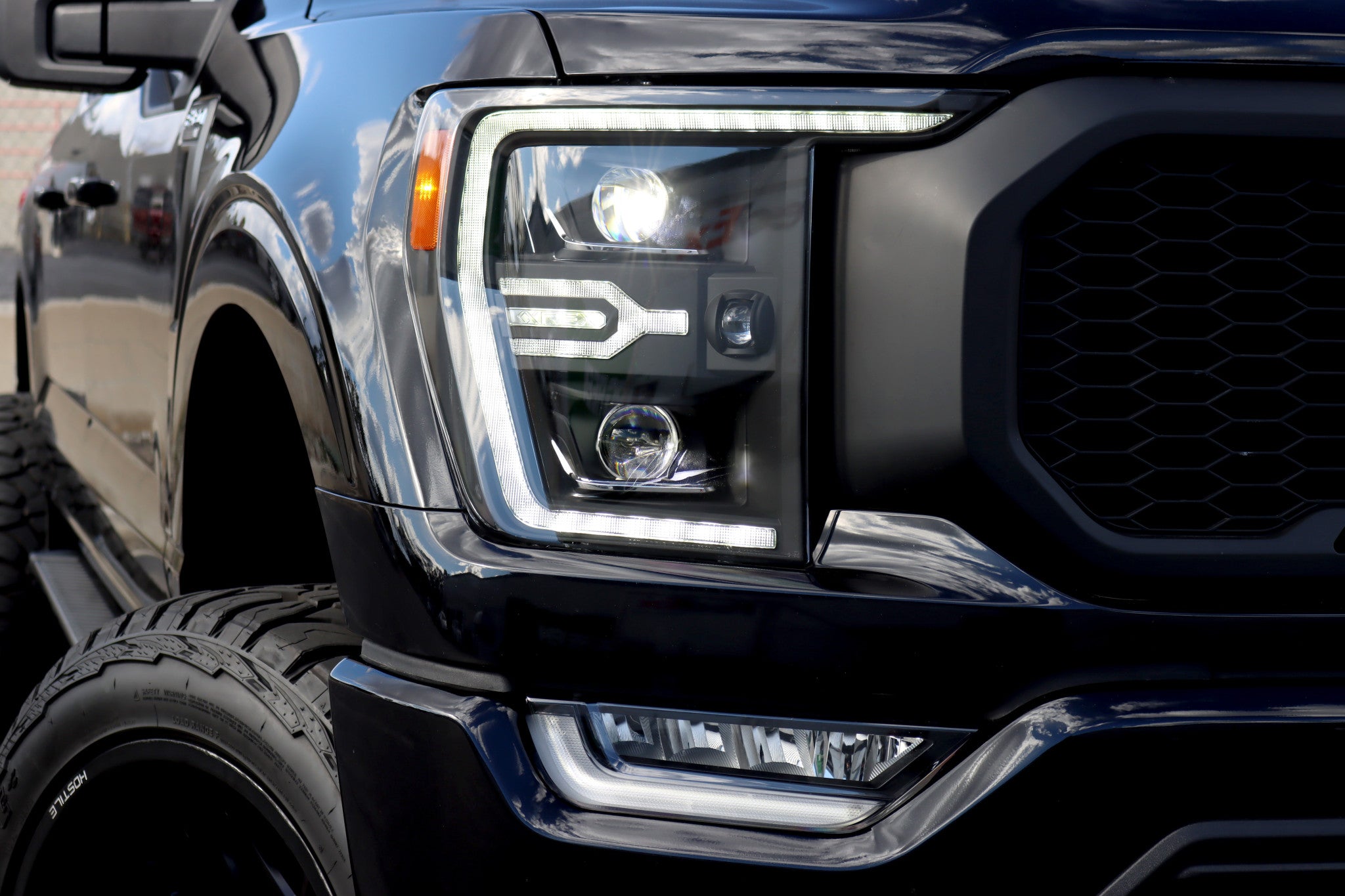 21-23 Ford F150 & F150 Raptor LUXX Series LED Projector Headlights - Alpha Black - Upgrade Your Truck's Lighting for Night Driving & Off-Road Adventures