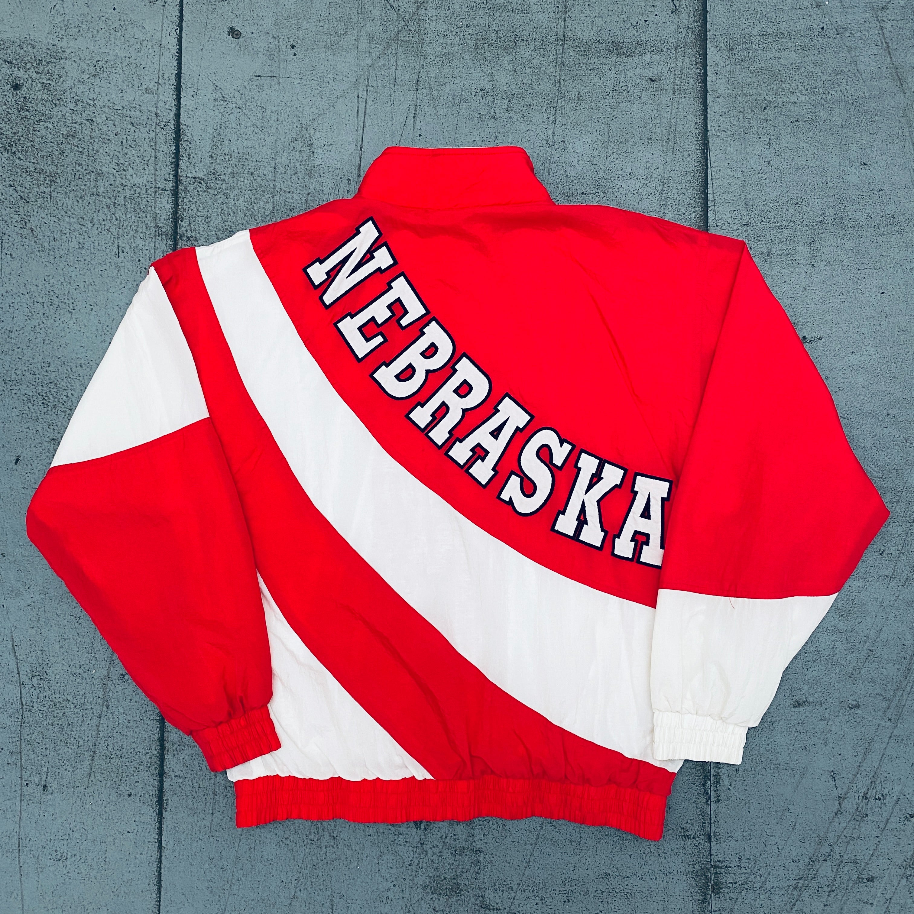 1990s Nebraska Cornhuskers Apex One Reverse Spellout Full-Zip Windbreaker Jacket - Vintage College Sports Apparel for Men - Perfect for Game Day, Tailgating & Fan Gear Collection