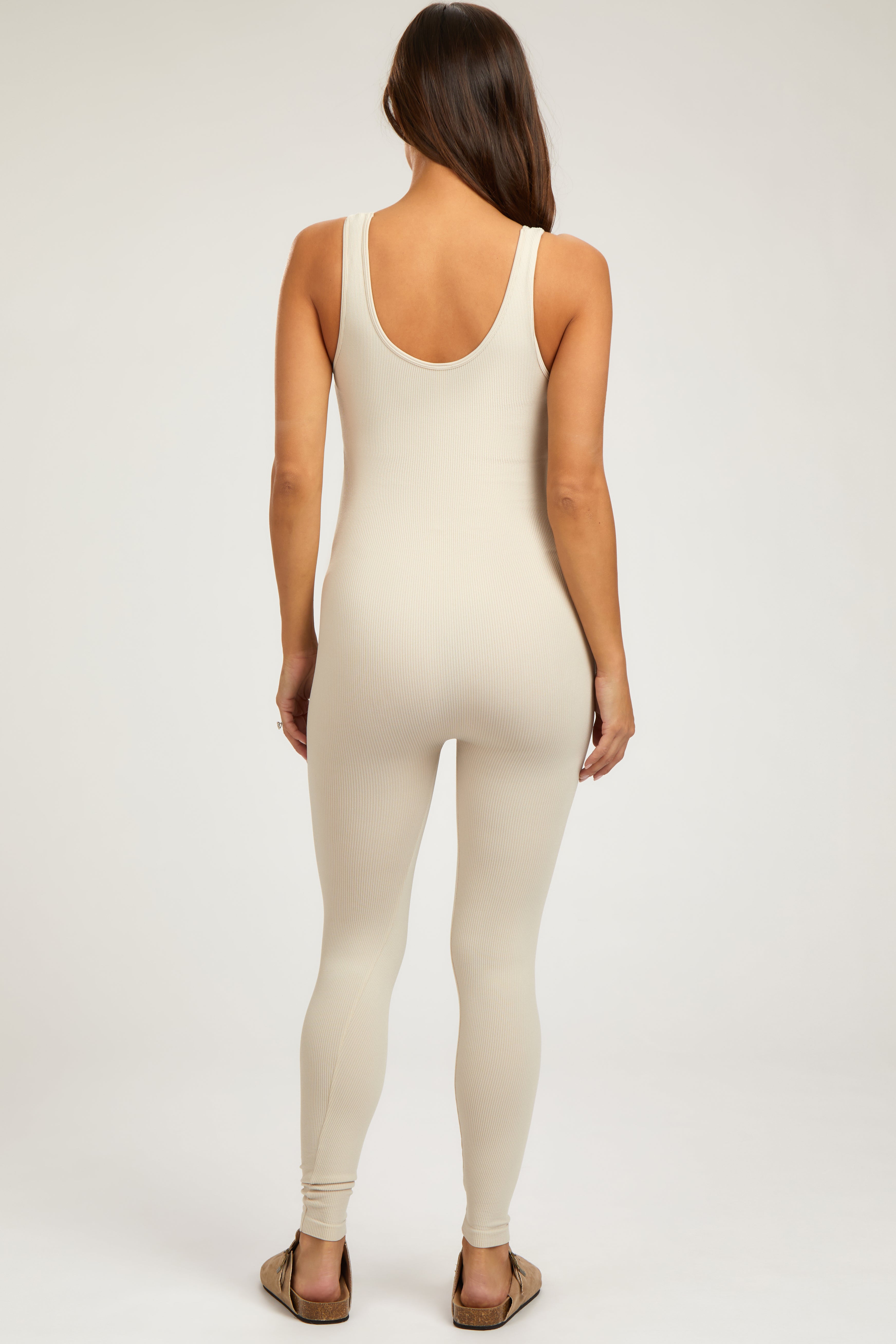 Beige V-Neck Seamless Ribbed Fitted Maternity Jumpsuit for Pregnant Women - Comfortable Stretchy Nursing Romper for Pregnancy & Breastfeeding