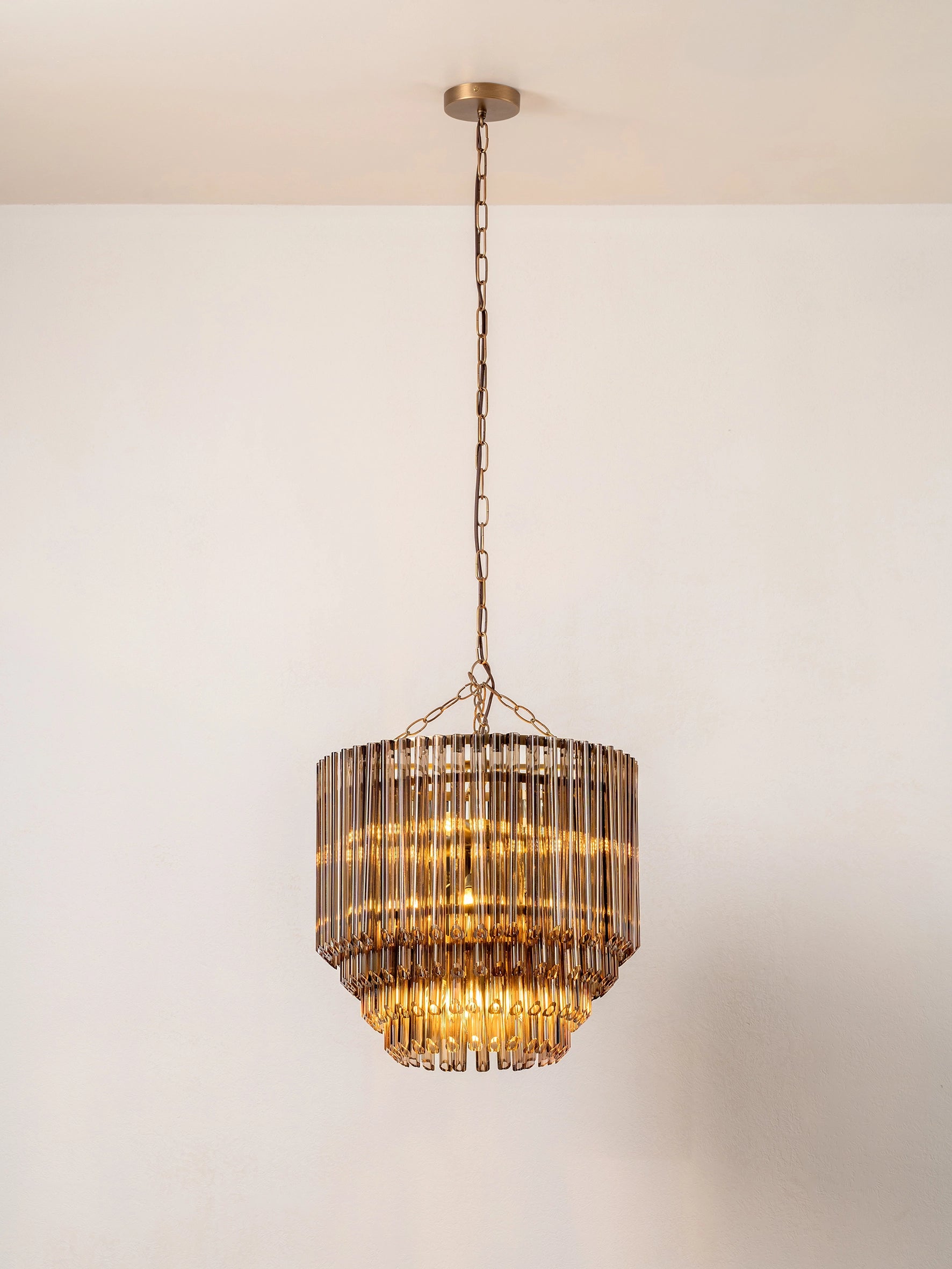 Petalia 9-Light Bronze Chandelier with Smoked Chocolate Glass Tubes - Elegant Dining Room Lighting for Home Decor & Modern Interior Design