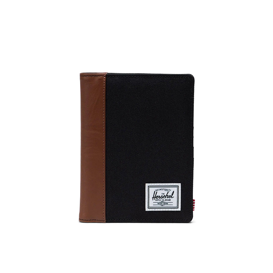 HERSCHEL HSC S424 Raynor RFID Blocking Passport Holder - Black/Tan Travel Wallet for Men & Women - Perfect for Airports & International Trips