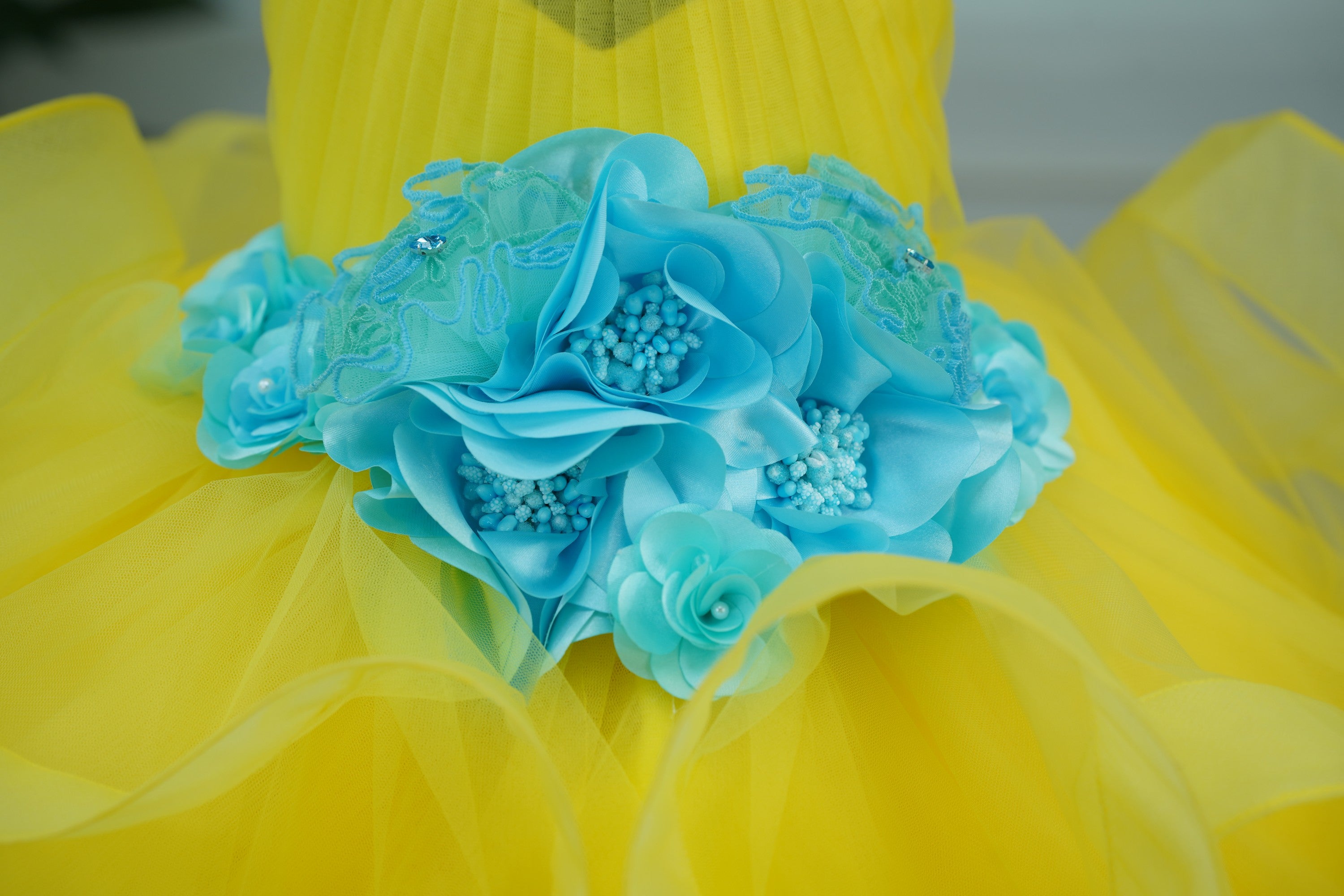Pre Order: Aqua Blue Halter Neck Twirled Couture Gown with Floral Embellishments – Perfect for Prom, Evening Parties & Special Occasions