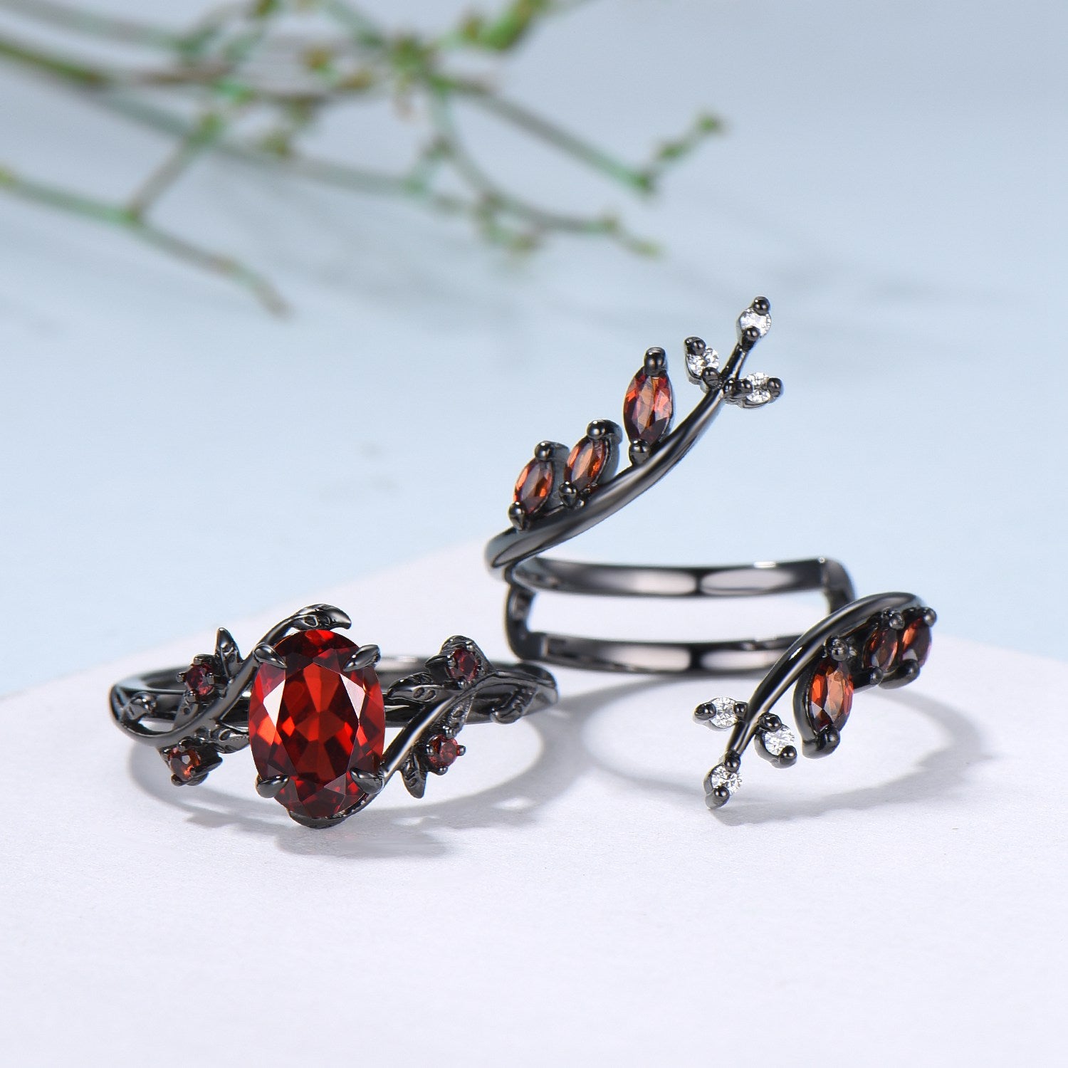 Black Gold Oval Garnet Engagement Ring Set - Nature Inspired Leaf & Vine Design, Gothic Wedding Jewelry with January Birthstone - Perfect for Romantic Proposals, Gothic Weddings & Unique Anniversary Gifts