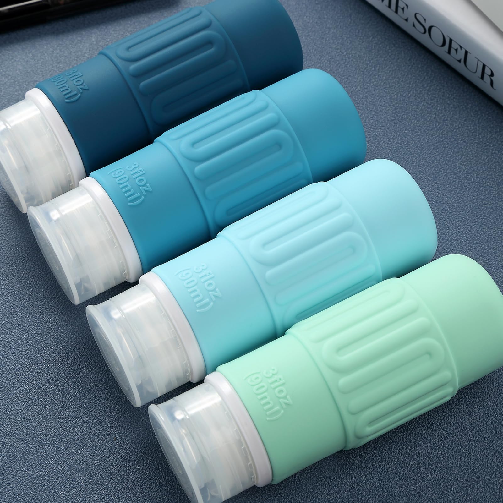 BPA-Free Leak-Proof Silicone Travel Bottles (4-Pack) – TSA Approved 3oz Toiletry Containers for Shampoo, Soap & Liquids | Reusable Travel Accessories with Toiletry Bag – Perfect for Airports, Gyms & Vacations