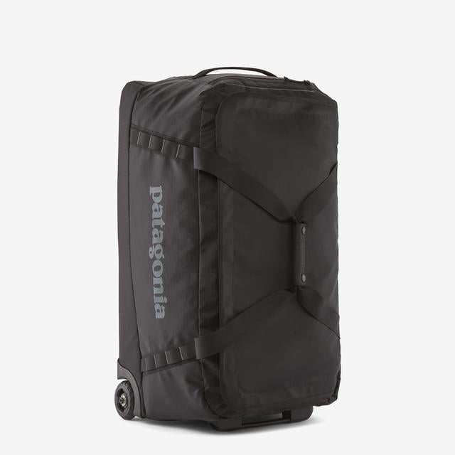Black Hole Wheeled Duffel Bag 70L - Large Travel Luggage with Wheels for Airplane Carry-On, Camping & Adventure Trips