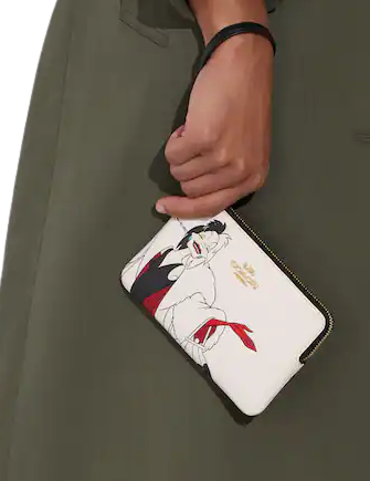 Coach Disney X Coach Corner Zip Wristlet with Cruella Motif - Stylish Crossbody Bag for Women, Perfect for Parties, Travel & Everyday Use