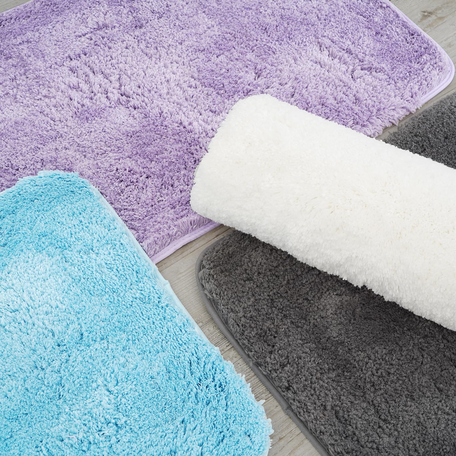 ROSMARUS Non-Slip Shaggy Bath Rugs 24x36 Inches - Super Soft Plush Bath Mat with High Water Absorbency for Bathroom Floor & Tub - Machine Washable Fluffy Shower Mat (Purple) - Perfect for Cozy Bathrooms & Spa-Like Showers