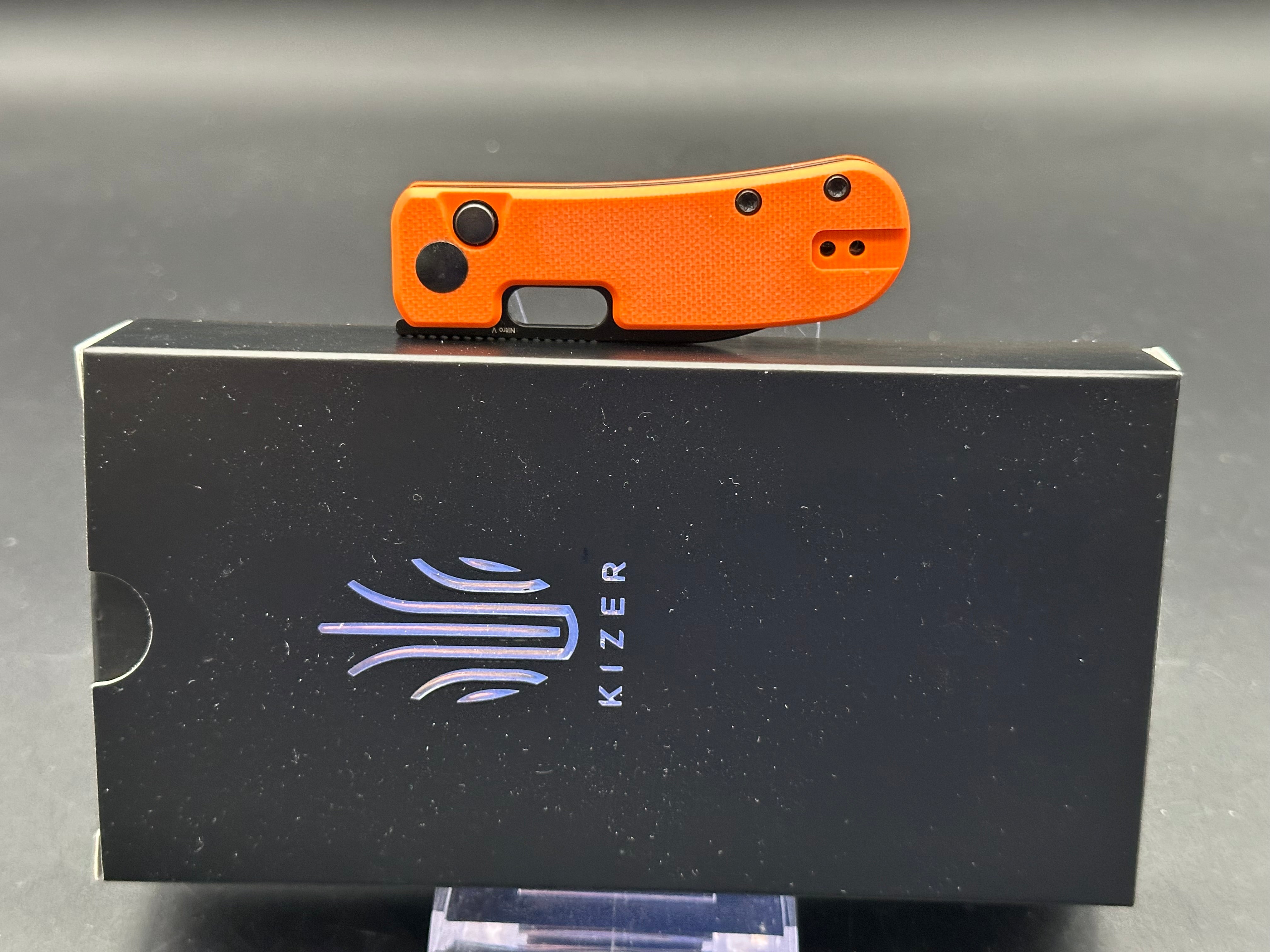 Kizer Banish Folding Knife - Nitro V Steel Blade, Button Lock, Orange Textured G10 Handle - EDC Pocket Knife for Outdoor, Camping & Everyday Carry