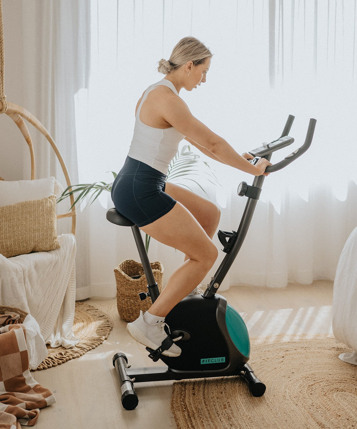 FitClub Exercise Bike for Home Workouts - Indoor Cycling Bike with LCD Monitor & Adjustable Resistance - Perfect for Cardio, Weight Loss & Fitness Training at Home