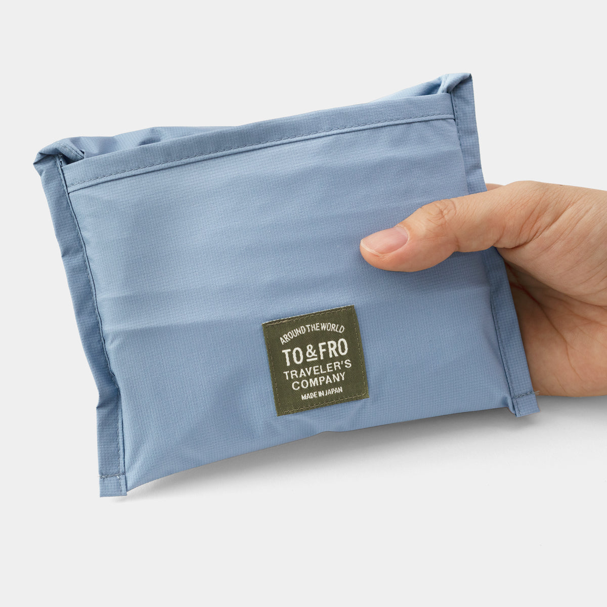 TRAVELER'S COMPANY Traveler's Factory x TO&FRO Waterproof Rain Bag - Blue Gray | Compact Travel Accessory for Outdoor Adventures & Commuting