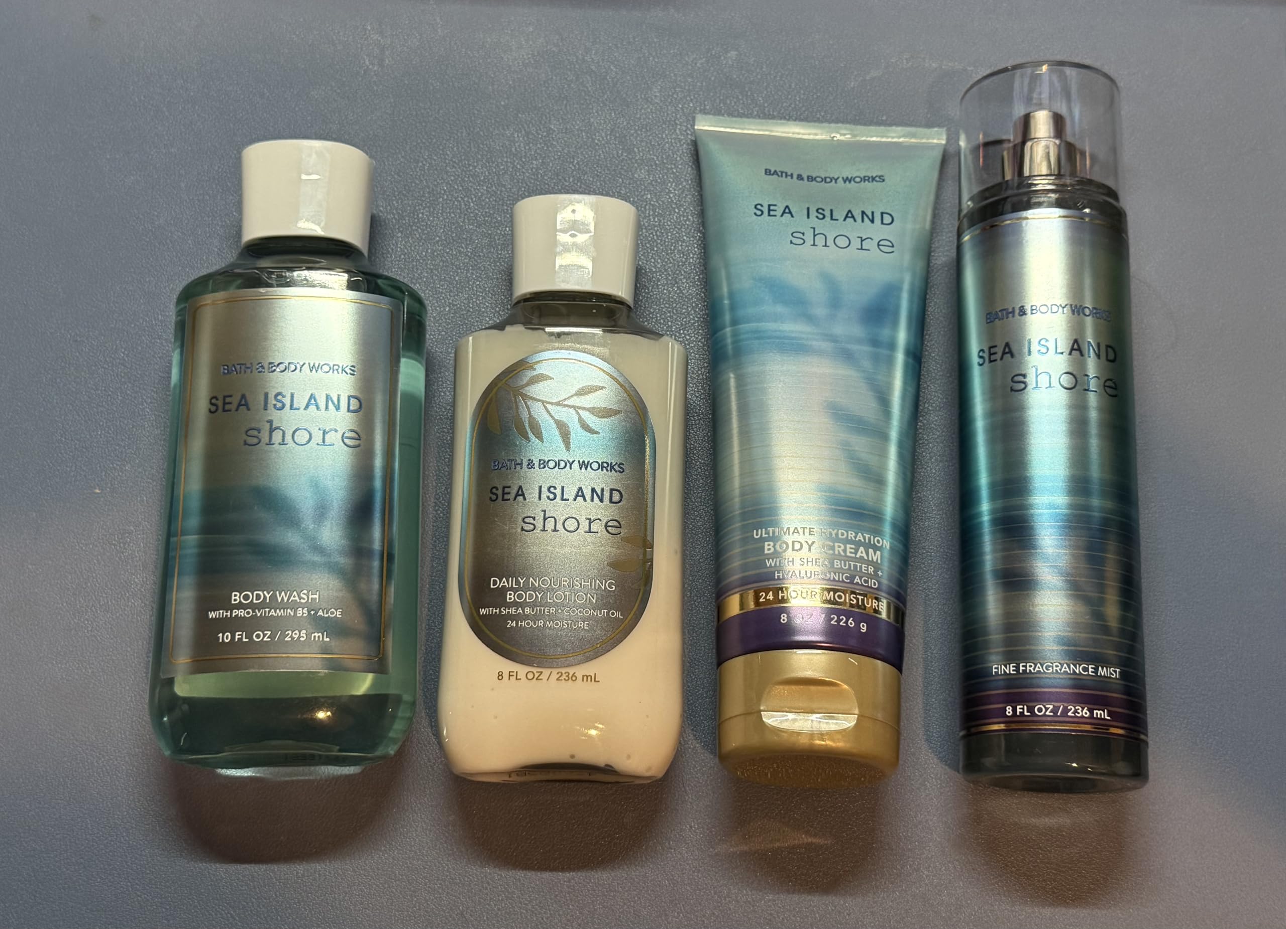 Sea Island Shore 4-Piece Bath & Body Gift Set - Full Size Body Mist (10 fl oz), Hydrating Body Cream (8 fl oz), Nourishing Body Lotion (8 oz), Refreshing Body Wash (8 fl oz) - Perfect for Spa Day, Self Care & Luxury Gift Giving