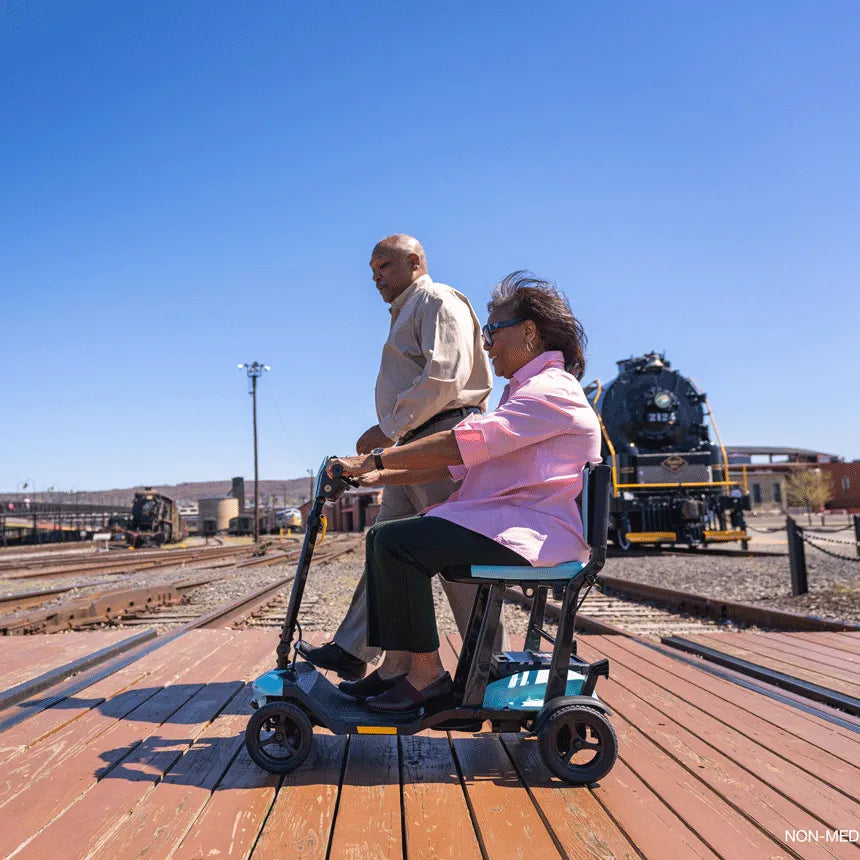 Pride Go Go Super Portable Mobility Scooter - Lightweight & Foldable for Seniors & Adults - Perfect for Travel, Shopping & Outdoor Adventures