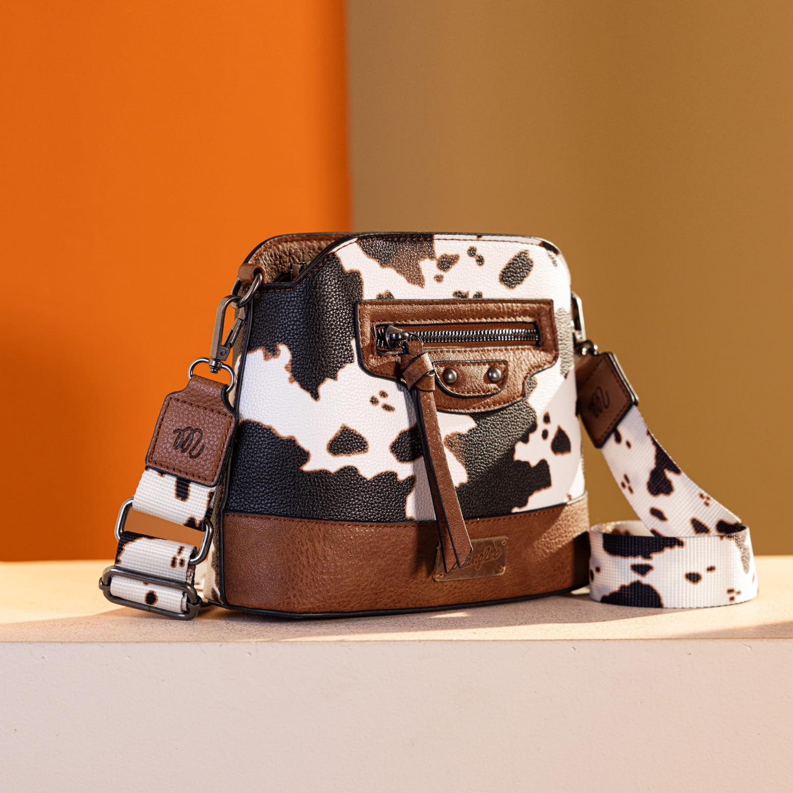 Wrangler Women's Cow Print Crossbody Bag - Western Style Leather Purse with Signature Strap for Everyday Use, Travel & Country Music Festivals