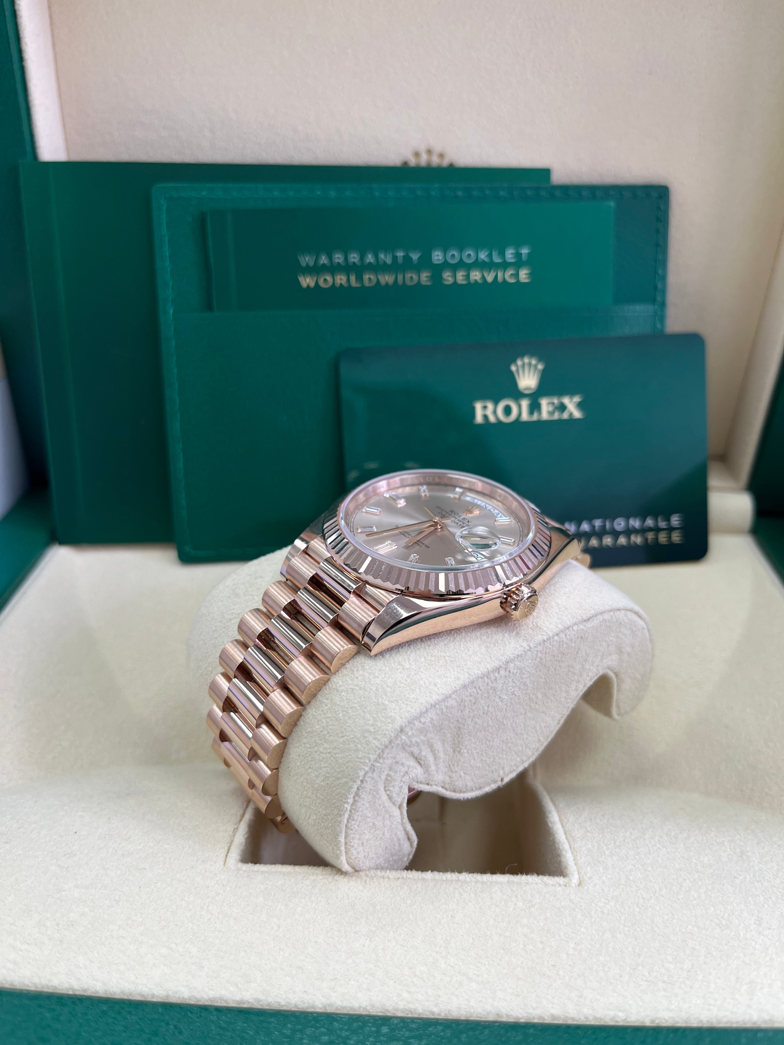 Rolex Day Date 40 Watch - 18K Yellow Gold, Fluted Bezel, Sundust Baguette Diamond Dial, President Bracelet 228235 | Luxury Dress Watch for Business & Formal Occasions