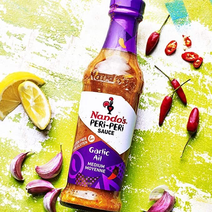 Nando's Garlic Peri Peri Hot Sauce - Spicy, Flavorful, Gluten Free, Vegetarian & Keto Friendly - 250ml Bottle - Perfect for Grilling, Marinades & Dipping Sauces
