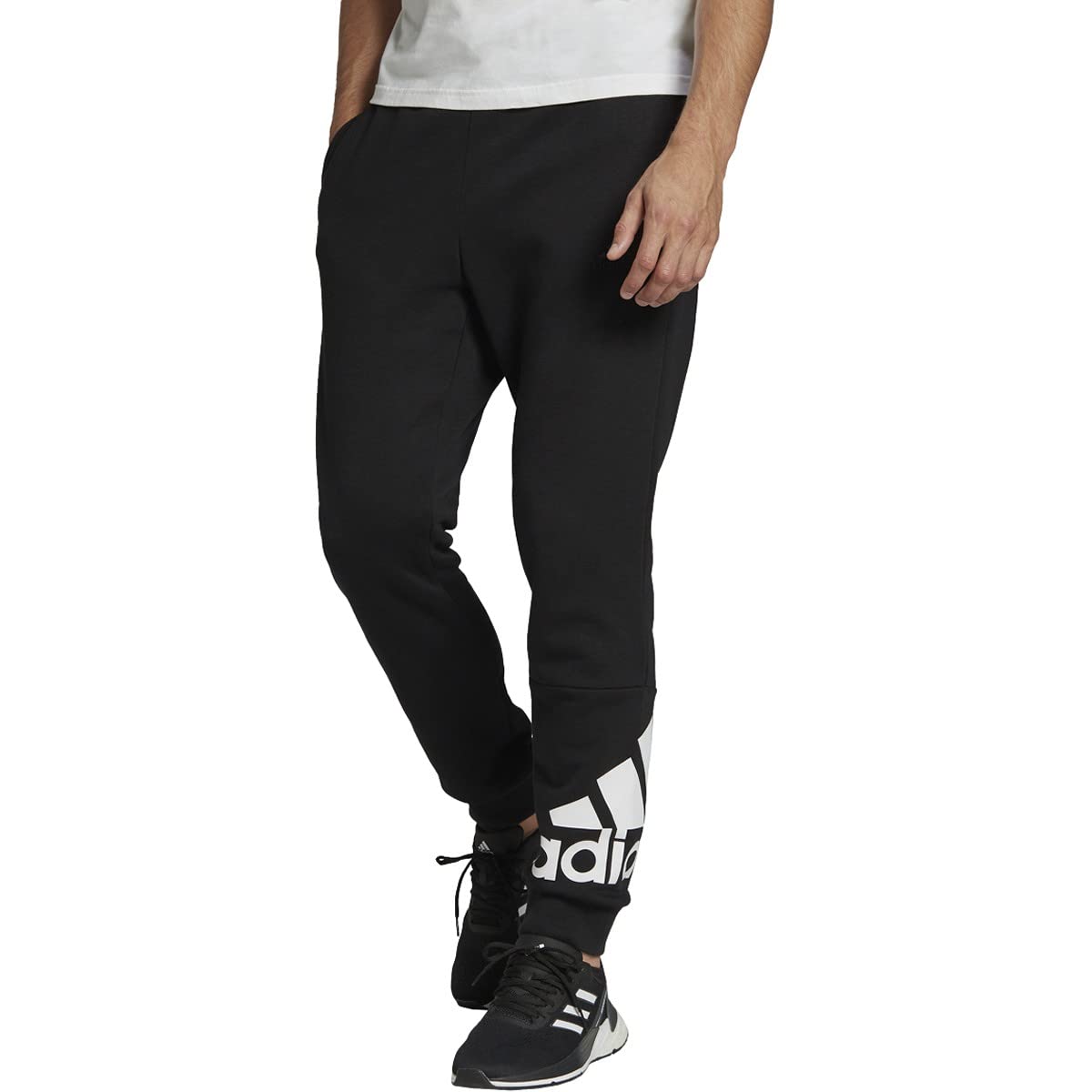adidas Men's Essentials Fleece Jogger Pants with Tapered Cuff & Logo - Comfortable Athletic Lounge Pants for Gym, Running & Casual Wear