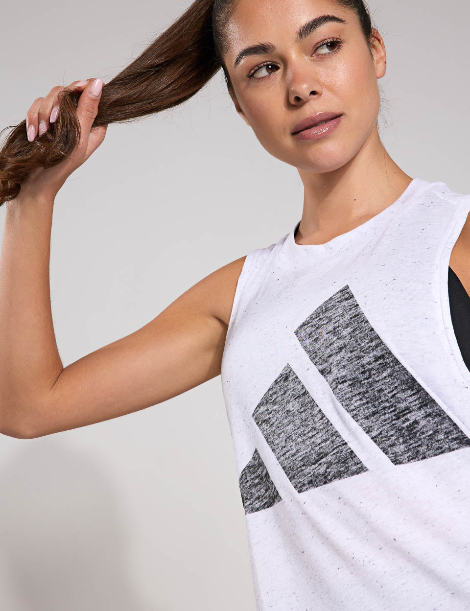 Essentials Winners Tank Top for Men & Women - Comfortable White & Black Sleeveless Shirt for Gym, Workout, and Casual Wear