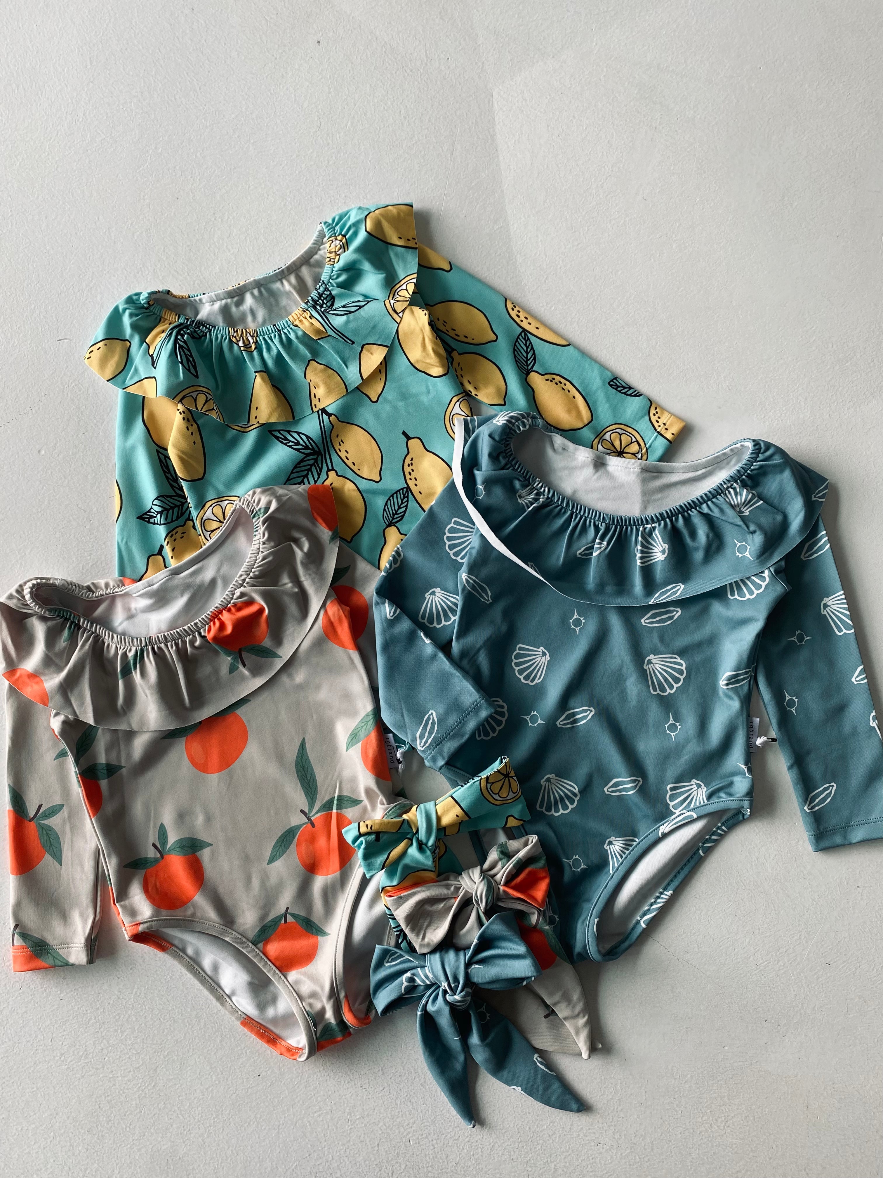 Girls' Ruffled Long Sleeve Swimwear with Hair Clip - Perfect for Beach, Pool & Summer Water Activities