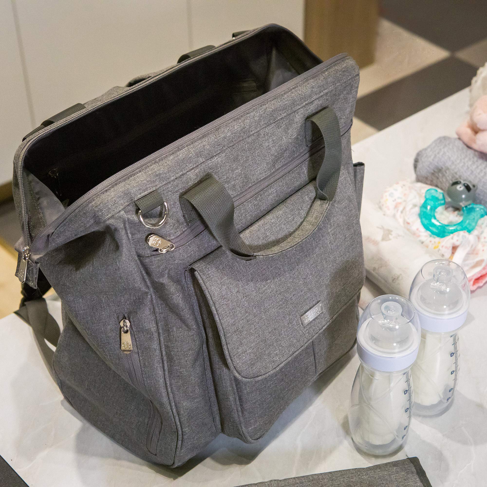 bblüv - Metrö Convertible Diaper Backpack | Stylish & Functional Baby Bag for Travel, Daycare & On-the-Go Parents | Waterproof & Spacious Diaper Tote with Changing Station