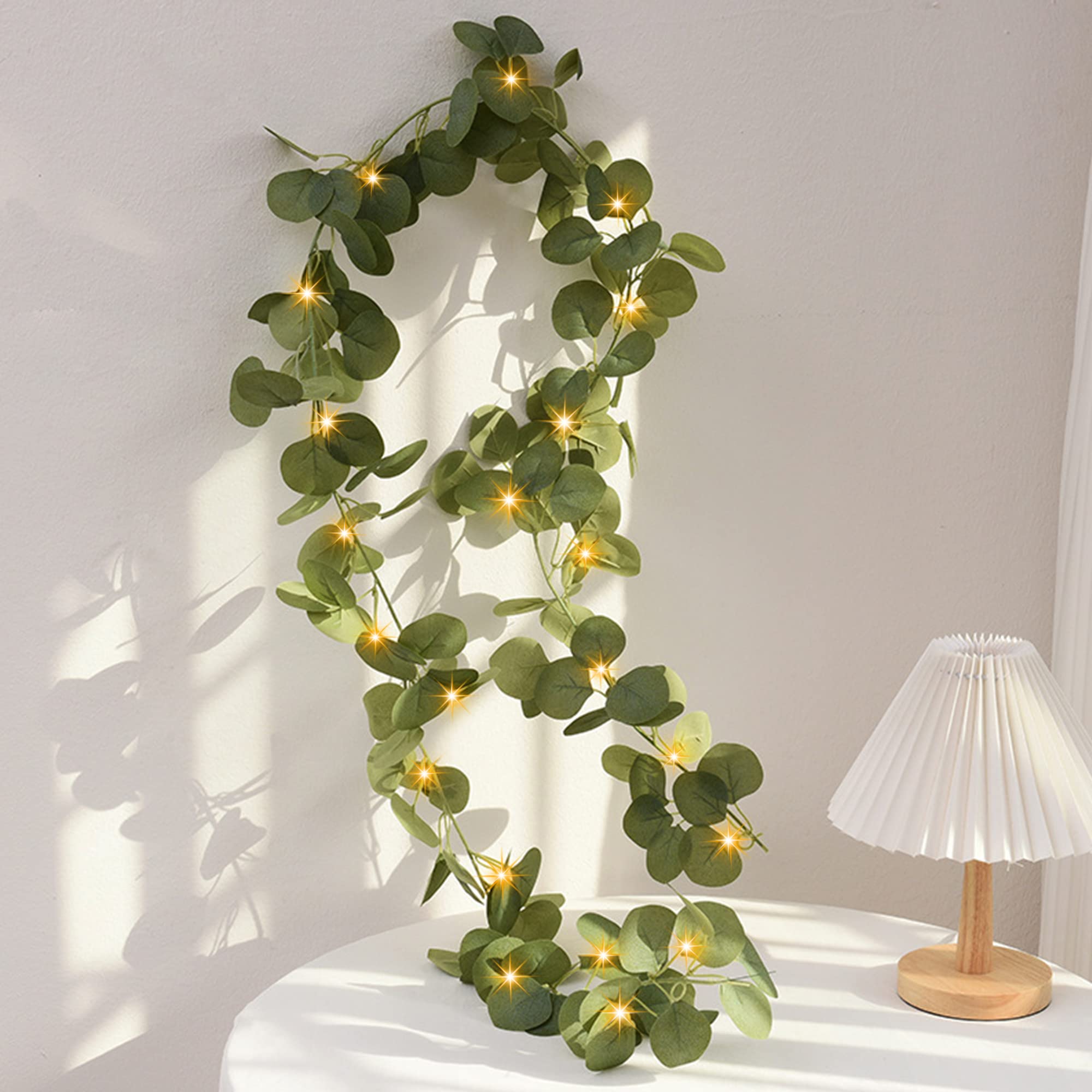 20 Warm White LED Eucalyptus Leaves Garland - 6.6ft Artificial Greenery String Lights for Home, Wedding & Party Decorations | Perfect for Wall Decor, Table Centerpieces, and Outdoor Lighting