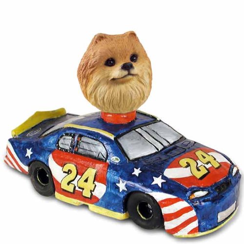 Pomeranian Red Race Car Dog Collectible Figurine - Cute Decorative Statue for Home, Office, or Gift for Dog Lovers