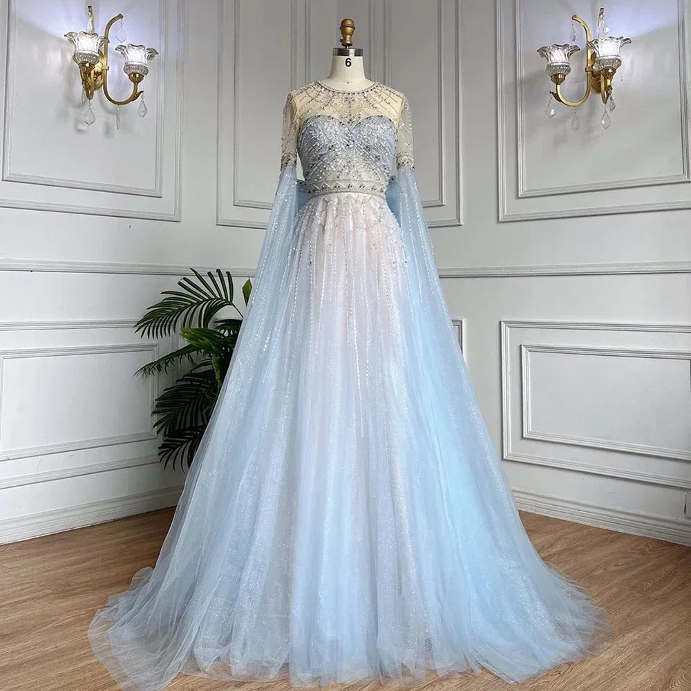 Elegant Blue A-Line Arabic Cape Sleeve Evening Gown with Beaded Bow Detail - Luxury Formal Dress for Women 2025 | Perfect for Weddings, Galas & Special Occasions
