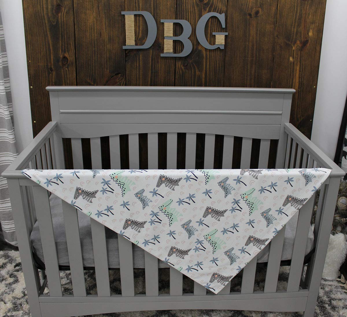 Dear Baby Gear Deluxe Baby Blanket - Soft Reversible Unisex Blanket for Newborns & Infants - Double Layer Crib Bedding Decor (Dinosaur & Palm Tree Print, Blue/Green, 40x30 Inches) - Perfect for Nursery, Stroller & Swaddling