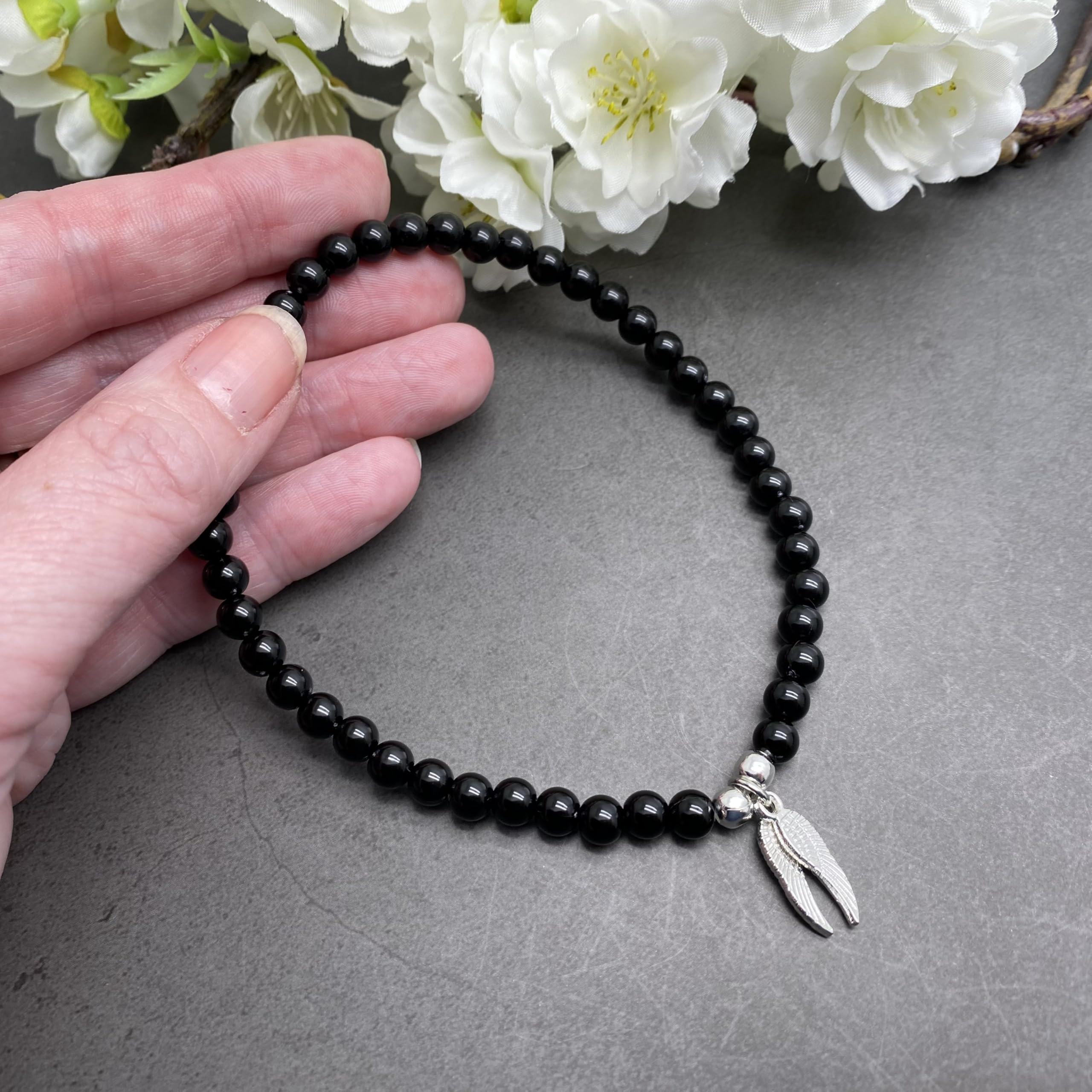 Angel Wings Charm Anklet - 6mm Black Acrylic Beaded Elastic Ankle Bracelet for Women | Adjustable 10-inch Size M/L | Stylish Everyday & Beach Jewelry | Perfect for Summer Outfits, Vacations and Boho Fashion
