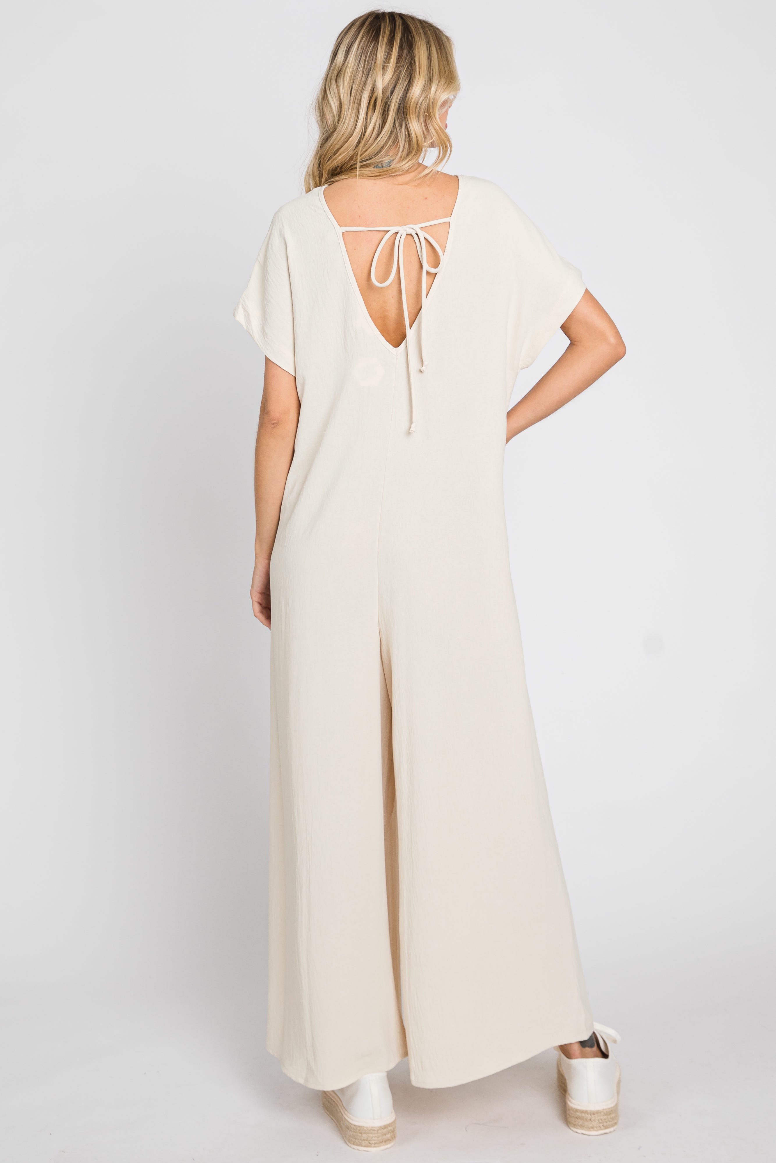 Beige Front Button Accent Jumpsuit for Women - Stylish Casual Romper with Pockets | Perfect for Summer Outfits, Beach Vacations & Date Nights