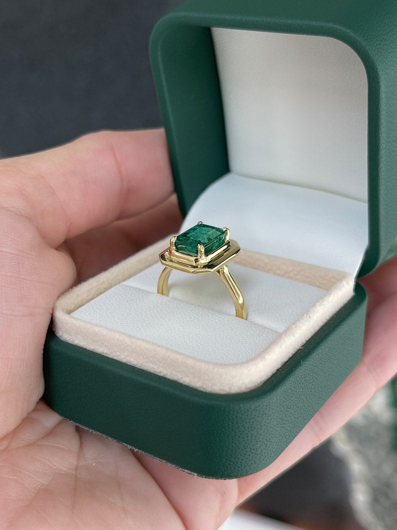 2.77ct 18K Natural Emerald Cut Mossy Green Solitaire Engagement Ring in Yellow Gold - Four Prong Half Bezel Setting for Wedding, Proposal & Anniversary Gifts