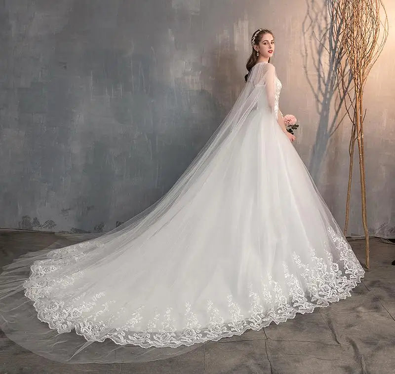 Elegant Long Sleeve Lace Wedding Dress with Long Train & Embroidery - Plus Size Princess Bridal Gown for Church, Beach, or Ballroom Ceremonies