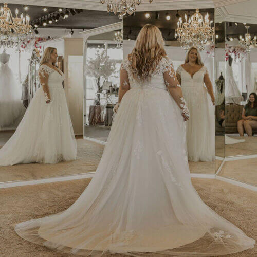 Elegant Plus Size Long Sleeve Lace Wedding Dress with V-Neck A-Line Silhouette | UK Bridal Gown for Church, Beach, and Garden Weddings