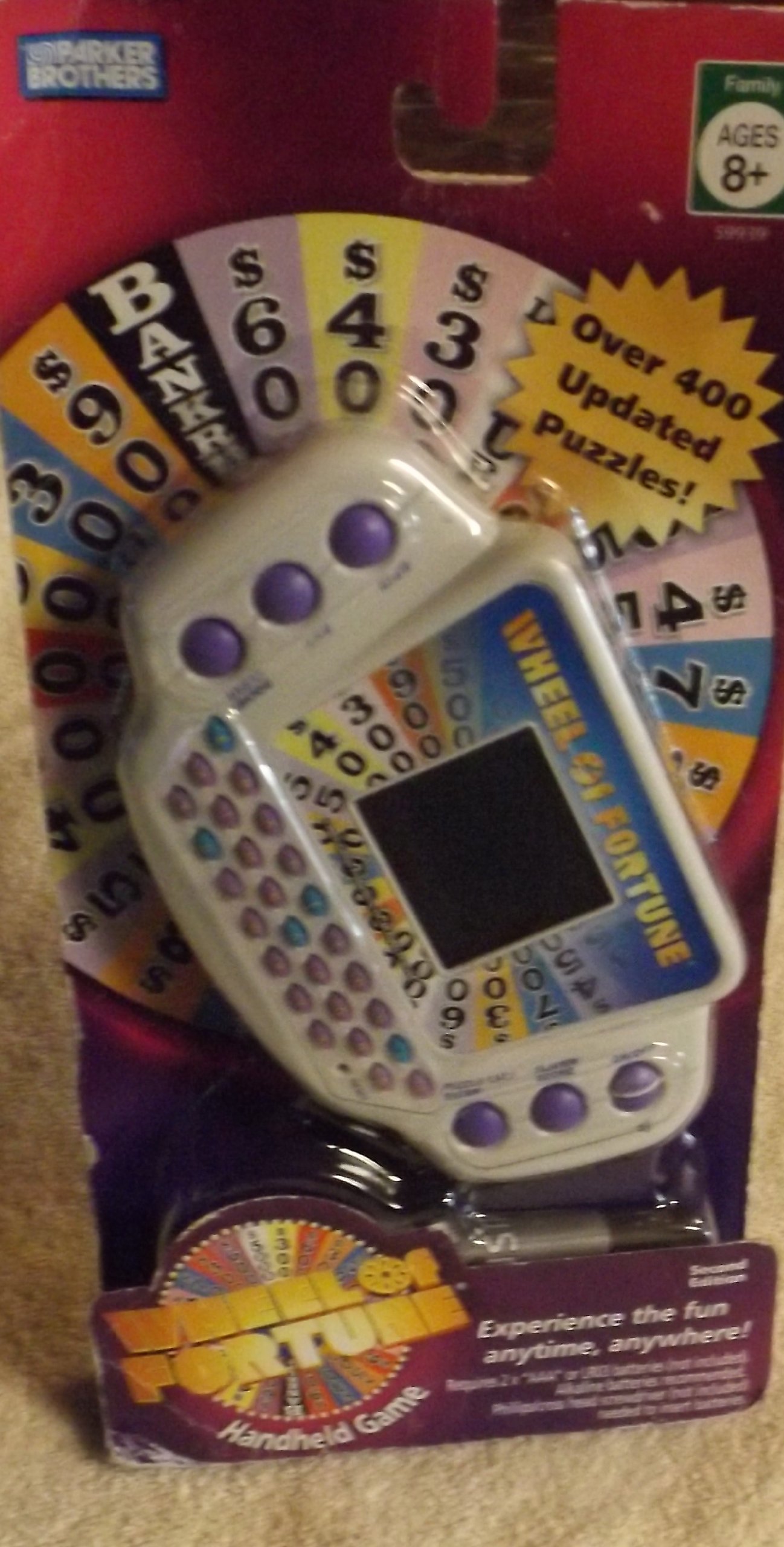 Wheel of Fortune Handheld Electronic Game by Hasbro Gaming - Fun Family Trivia Challenge for Parties & Travel