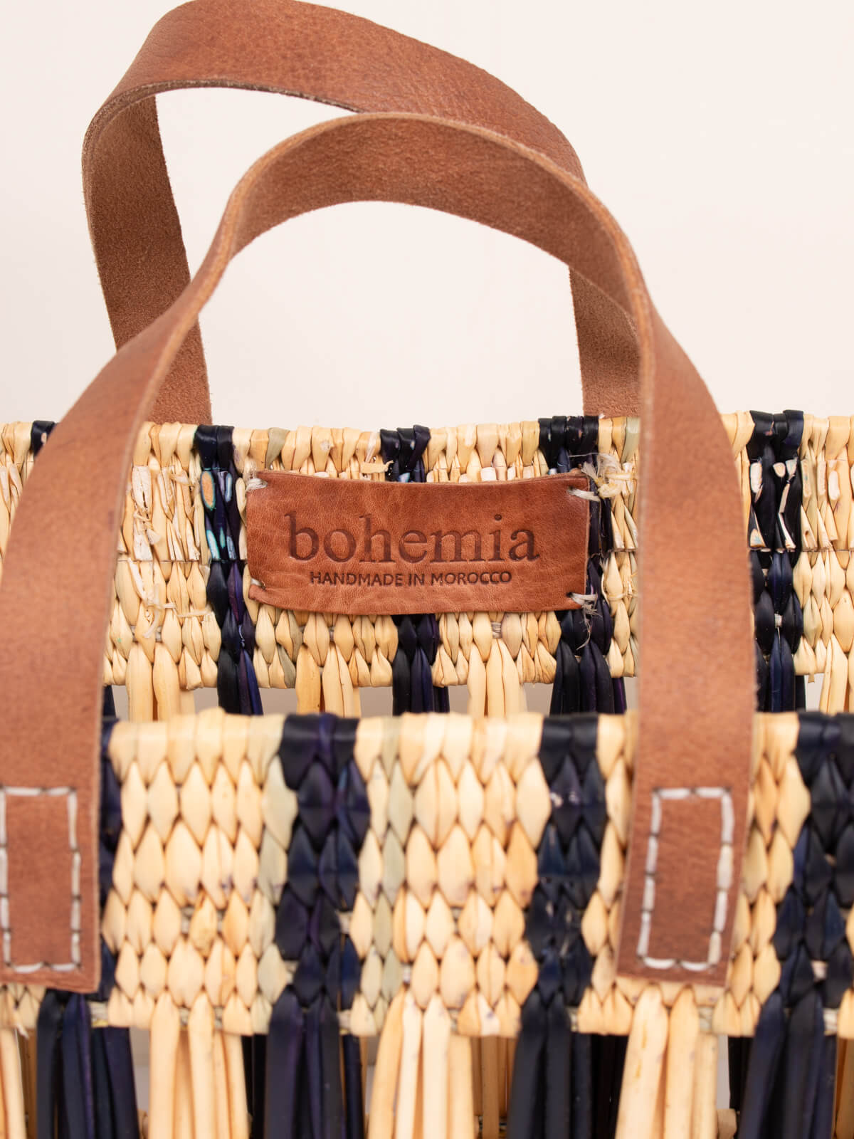 Handwoven Decorative Reed Basket with Indigo Stripes - Natural Storage Solution for Home, Office, and Gift Giving