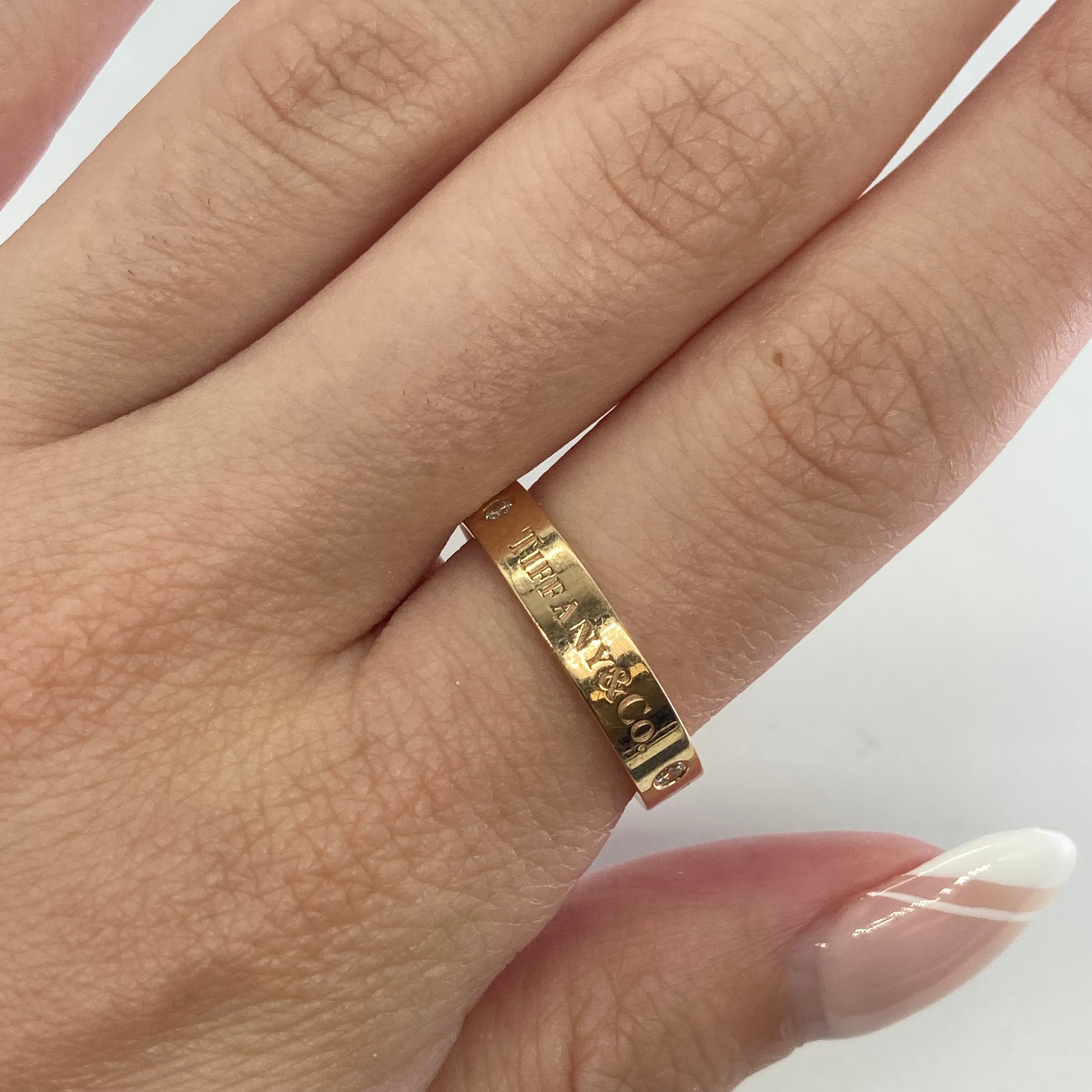 Tiffany & Co. 0.09ctw Diamond Band Ring Size 7.5 - Elegant Wedding Band, Anniversary Gift, or Everyday Jewelry for Women