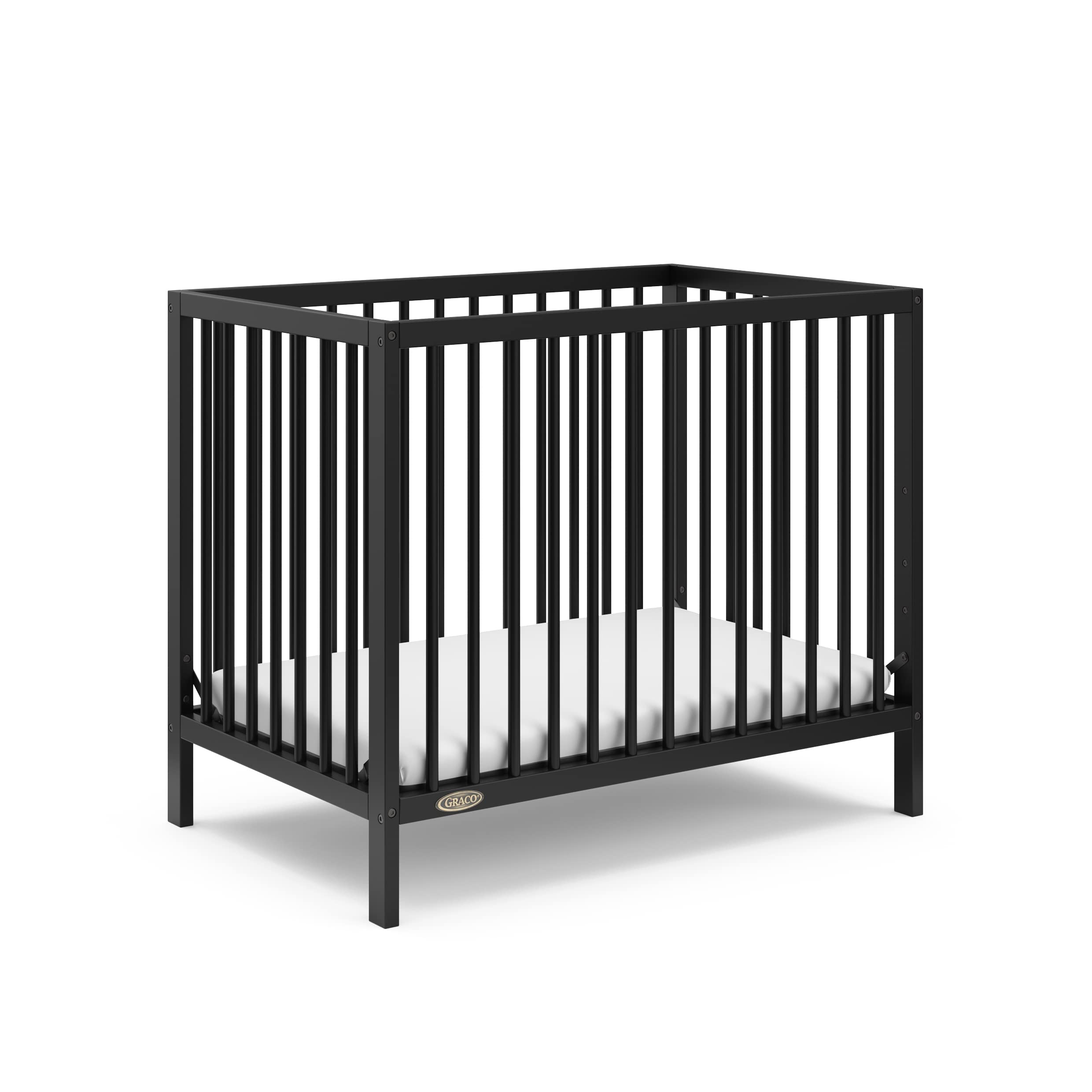 Graco Teddi 4-in-1 Convertible Mini Crib with Waterproof Mattress - GREENGUARD Gold Certified, Compact Nursery Bed for Small Spaces, Easy 30-Min Assembly (Black) | Perfect for Apartments, Daycares & Travel | Includes 2.75-Inch Mattress