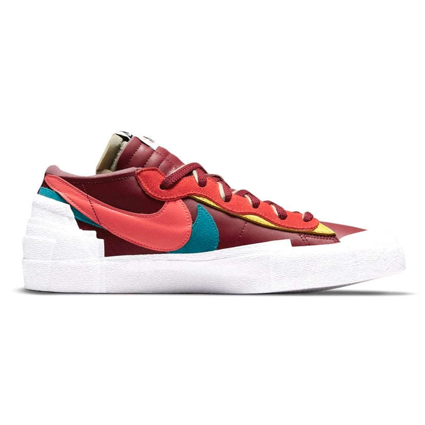 KAWS x Nike x Sacai Blazer Low Sneakers - Team Red/Hot Lava/White Colorway - Limited Edition Collaboration Shoes for Streetwear & Sneaker Collectors